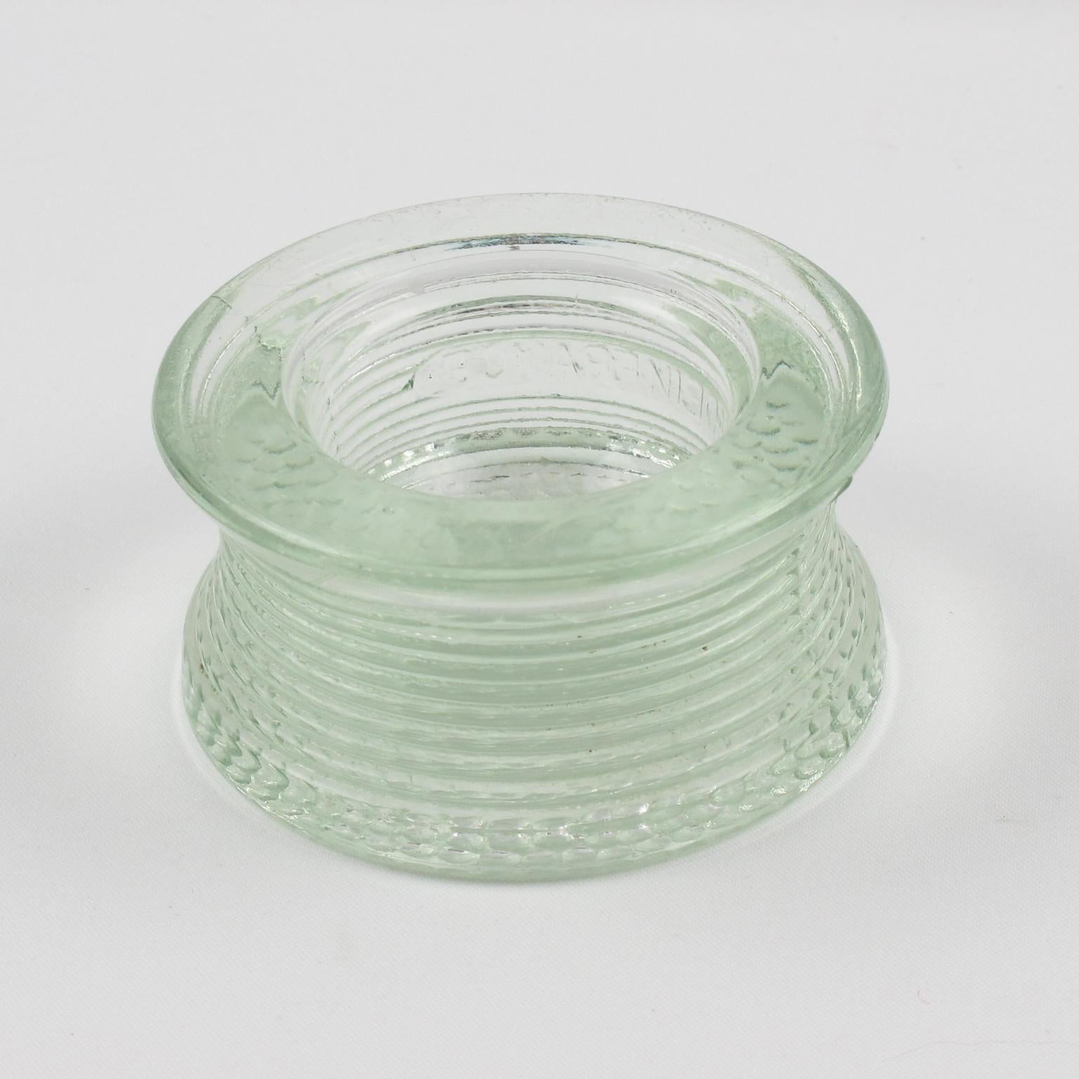 Industrial thick molded glass desktop accessory (desk tidy - ashtray - catchall) manufactured by Lumax, France. Original design by Le Corbusier. Engraved 'Made in France' on side. Lovely round shape with stripes.
Measurements: 3.94 inches diameter