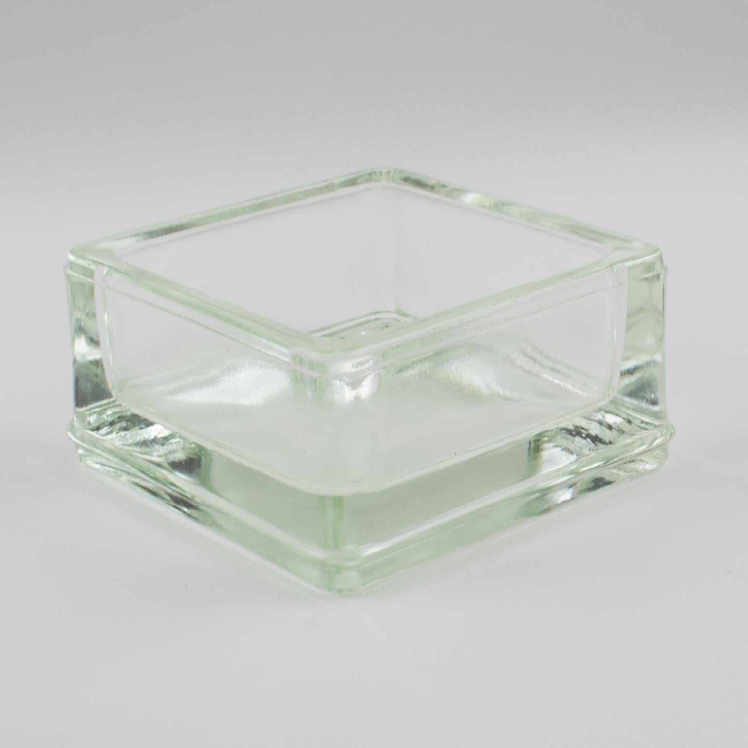 This 1950s industrial thick molded glass desktop accessory, designed by one of the most influential architects of the 20th century, Le Corbusier, is the perfect desk tidy, ashtray, or catchall. Manufactured by Lumax in France, this stylish and