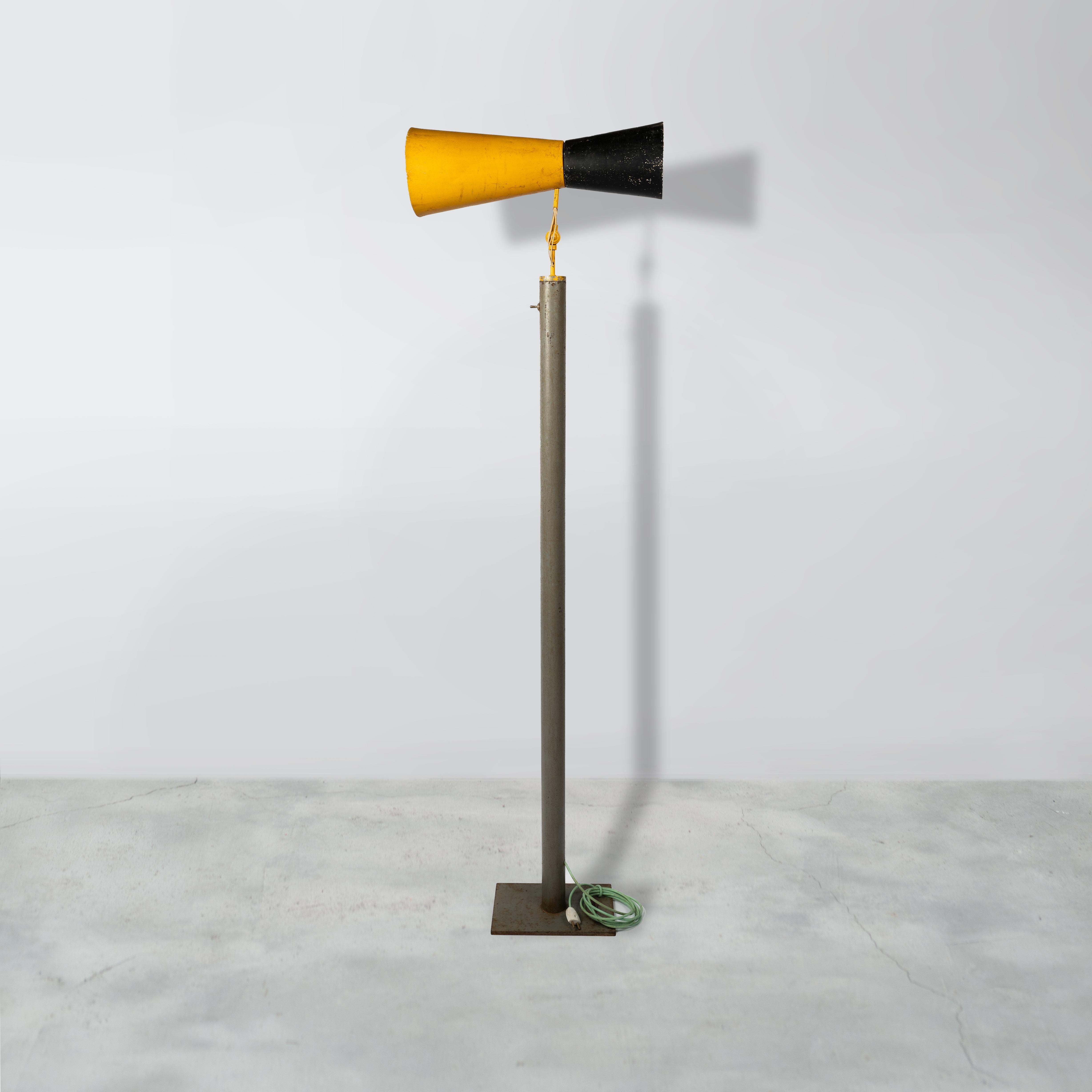 This lamp is not only a fantastic piece, it’s a rare collectors item. It is raw in its simplicity, embodying an expressing a nonchalance. It is a beautiful piece that could be put in a bedroom, in a walk way or as additional object in a living room.