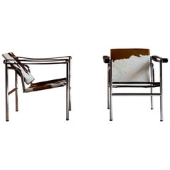 Le Corbusier LC1 Basculant Chairs by Charlotte Perriand and Pierre Jeanneret