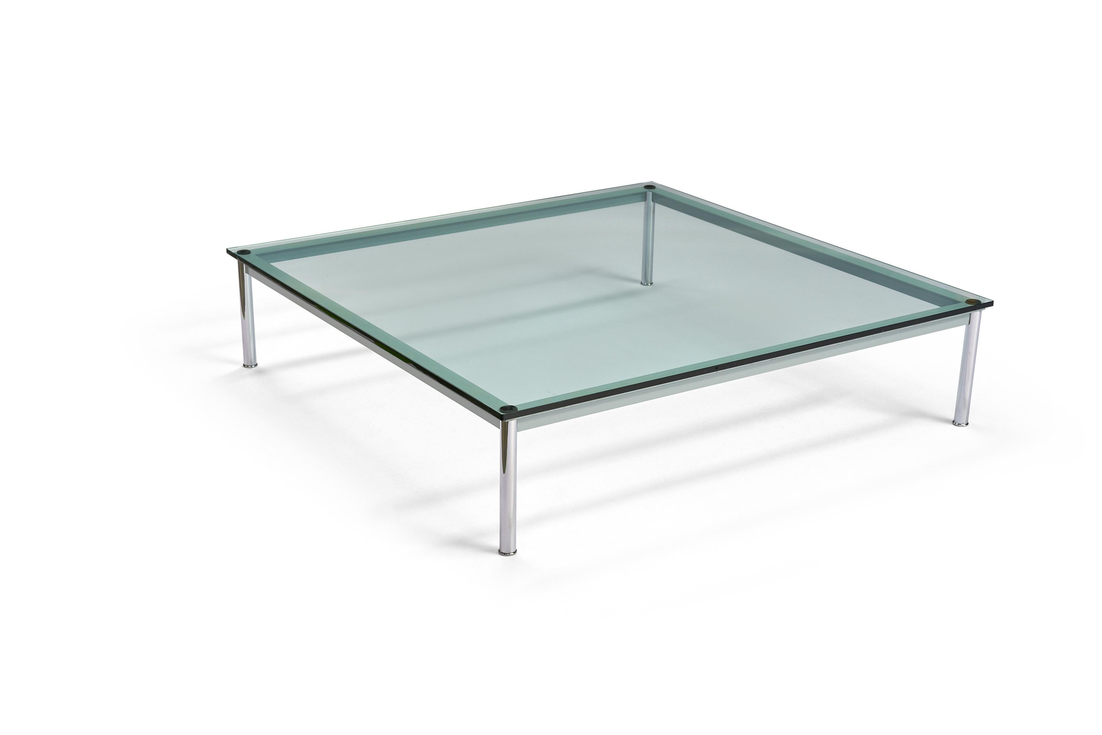 Le Corbusier lc10-p low table for Cassina

Large glass top coffee table with chrome steel legs and painted frame

Square shape

Measures: 55” W x 55” D x 13” H

Original condition with small scratches to glass.
   