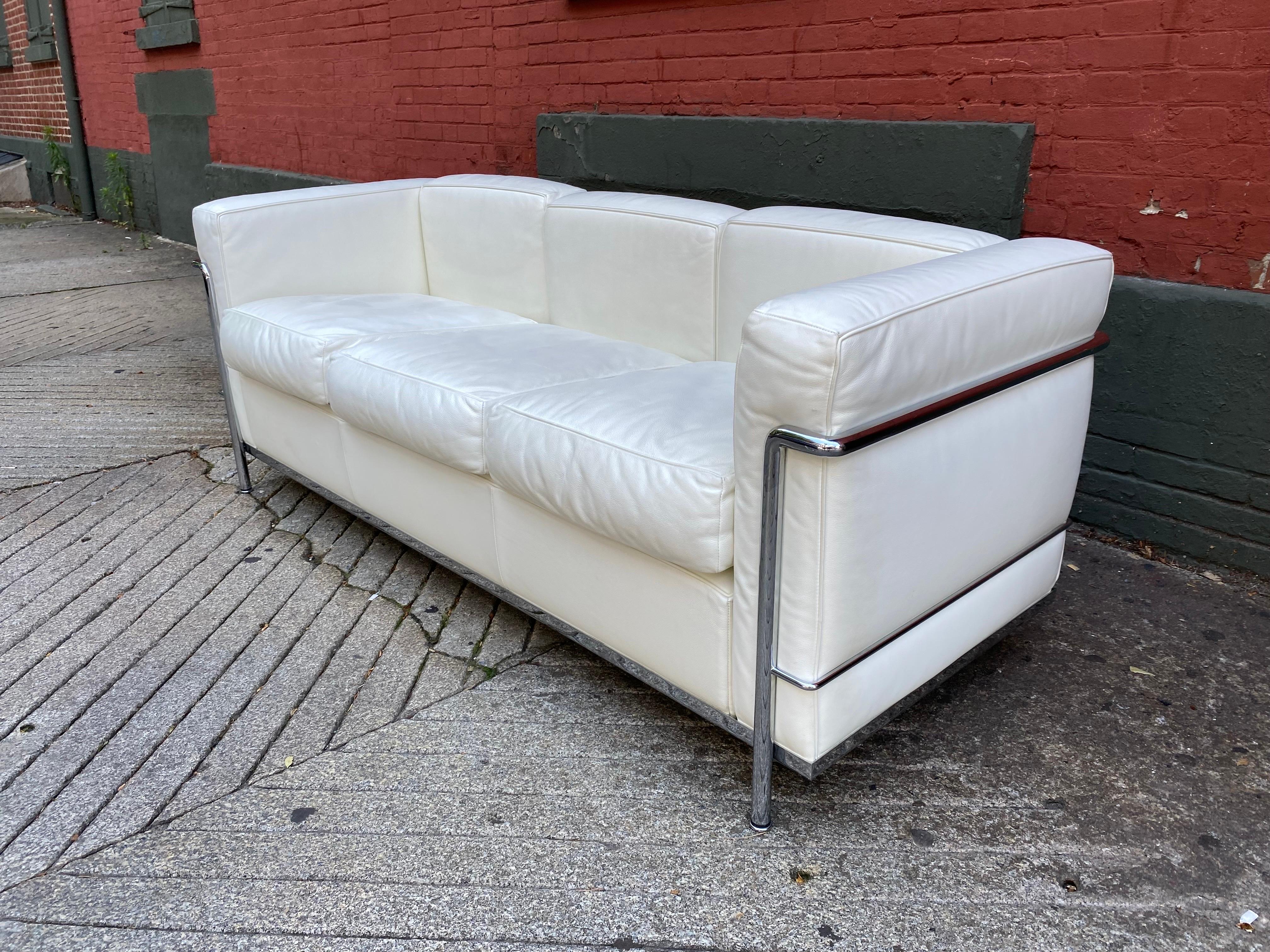 Le Corbusier LC2 ivory 3 seat sofa from 2014. Sofa in great shape, retains labels and cassina logo and numbers in chrome frame. Timeless Classic! Ready to go!