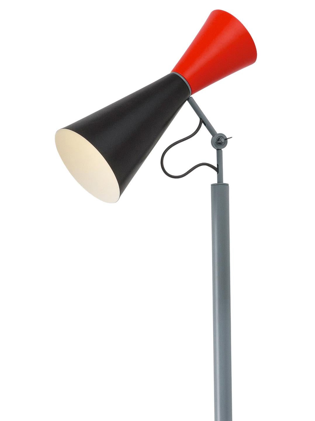 Le Corbusier 'Parliament' floor lamp for Nemo in black and red. 

Le Corbusier designed the Parliament lamp for the Chandigarh Parliament in India. This iconic floor lamp features a two-way light source, with a dual-cone design executed in painted