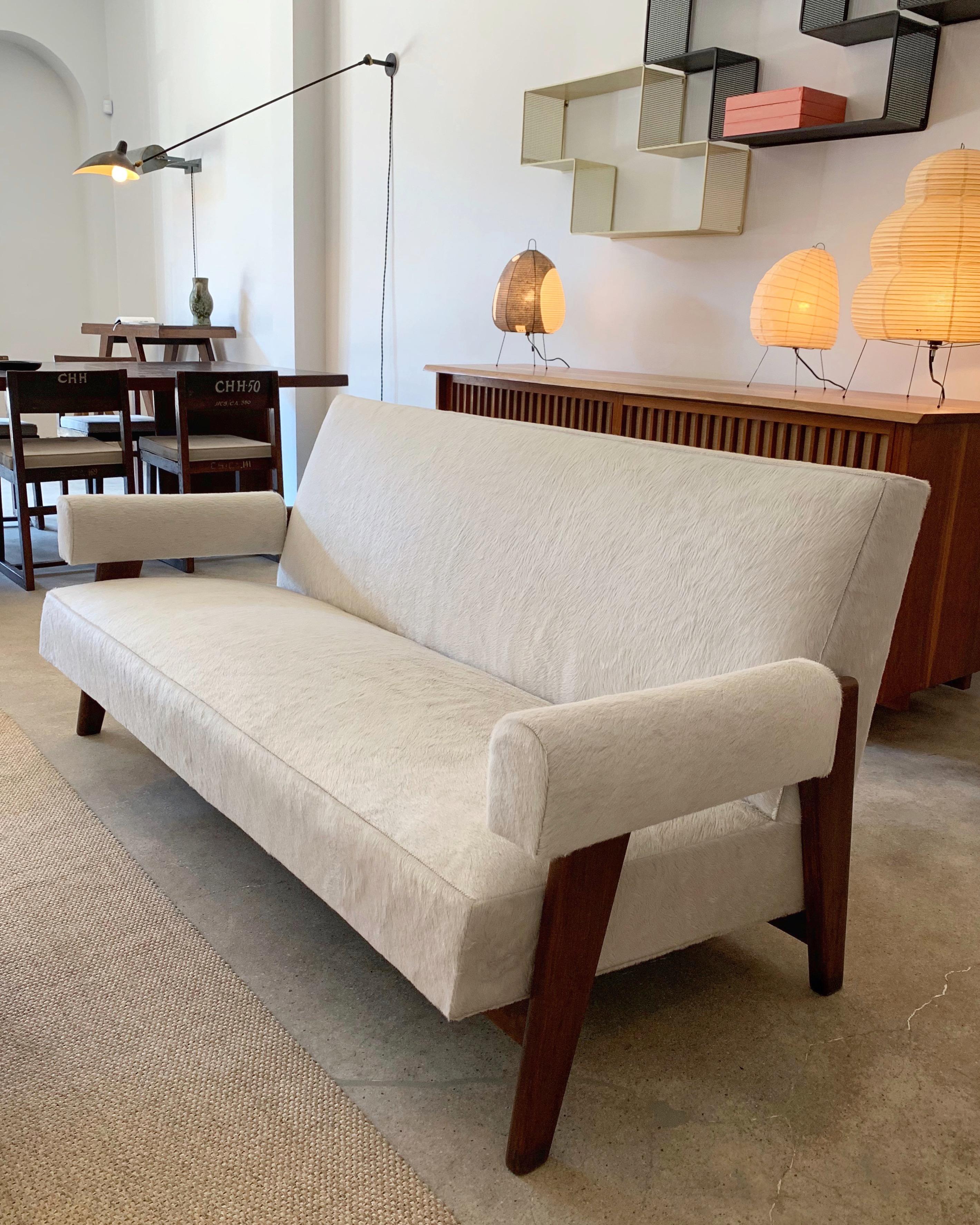 Rare Le Corbusier & Pierre Jeanneret sofa designed for the High Court and Assembly, Chandigarh, circa 1955-1956.

Restored with a stunning off white hide. 

Images prior to restoration available.