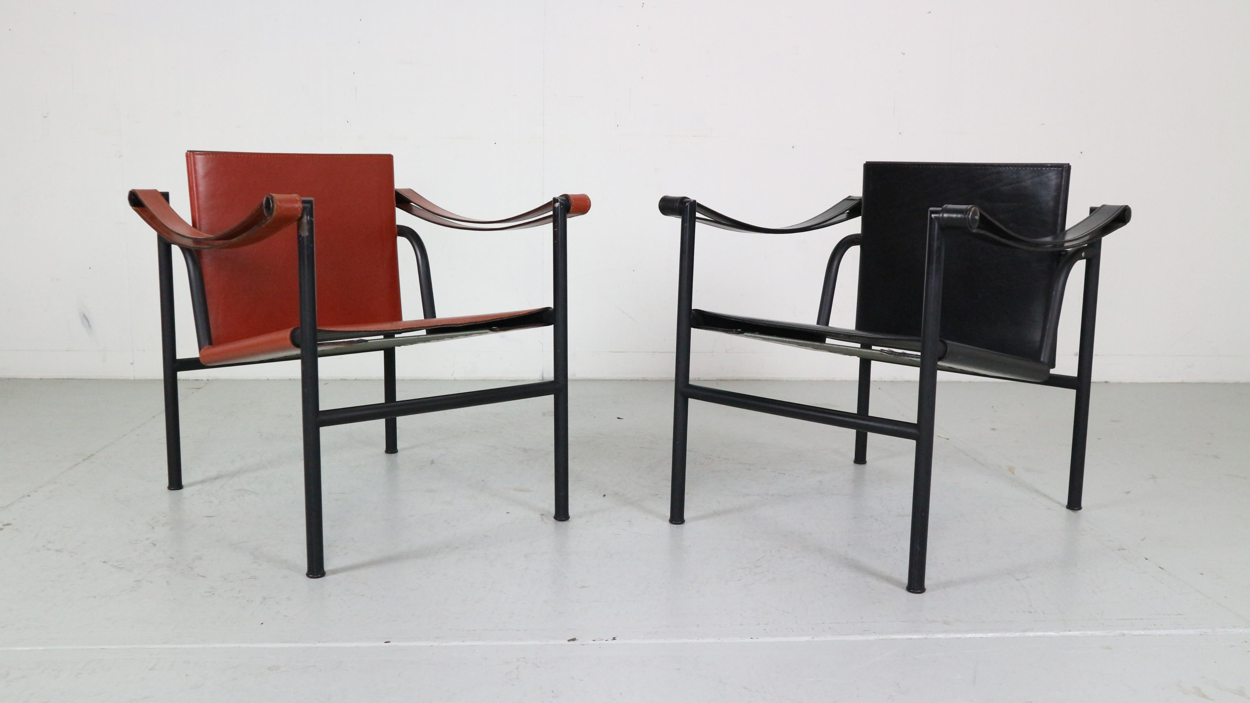 Set of 2 armchairs designed by Le Corbusier and manufactured for Cassina, famous Italian furniture manufacture in 1970s period.

Both chairs are original signed, low number early edition and comes with documentation.
Model number- LC1 Sling
