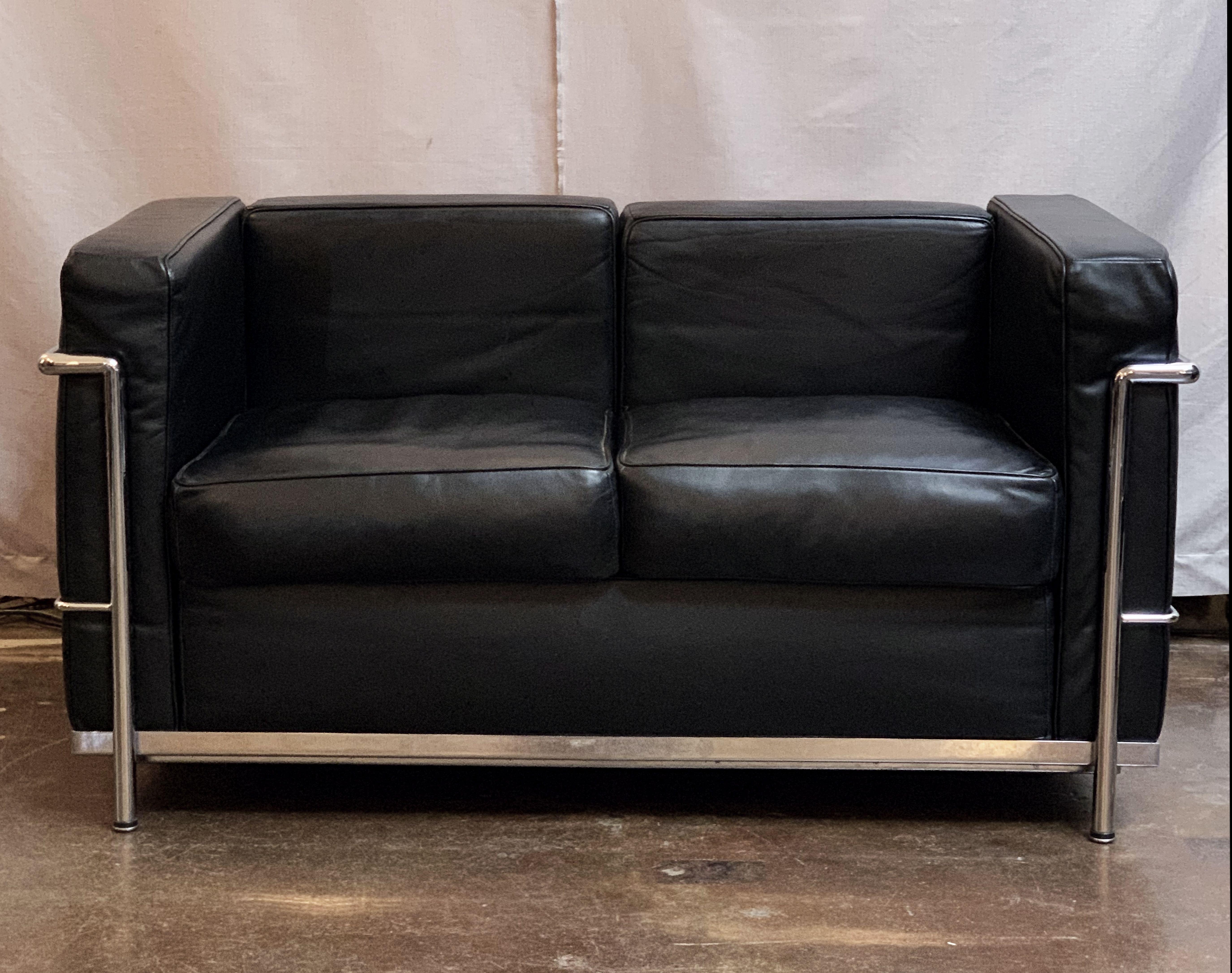 black leather and chrome sofa