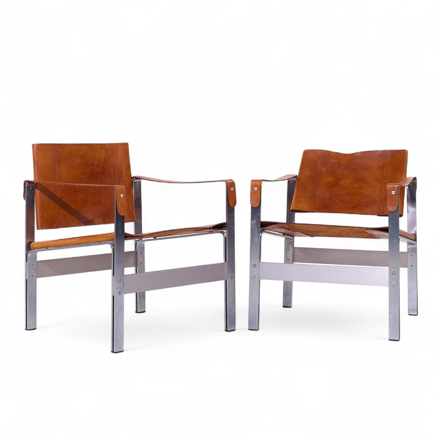 Le Corbusier Style Mid Century Leather and Stainless Steel Sling Lounge Chairs

Each chair measures: 23.5 wide x 24.5 deep x 29.75 high, with a seat height of 17 and arm height/chair clearance of 24 inches

We take our photos in a controlled