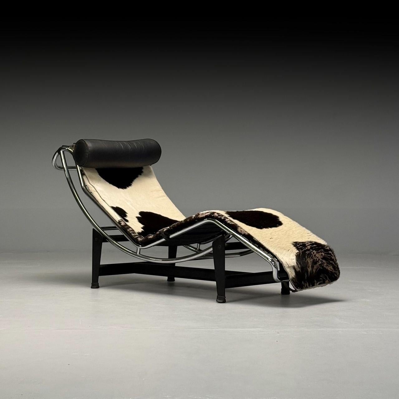 Le Corbusier Style, Mid-Century Modern, LC4 Chaise Lounge, Cowhide, Metal, 20th C.

Chaise lounge styled after Le Corbusier's iconic LC4 in natural cowhide, black leather, and metal. Missing hide in a few small spots.

Cowhide, Metal; Italy, 20th