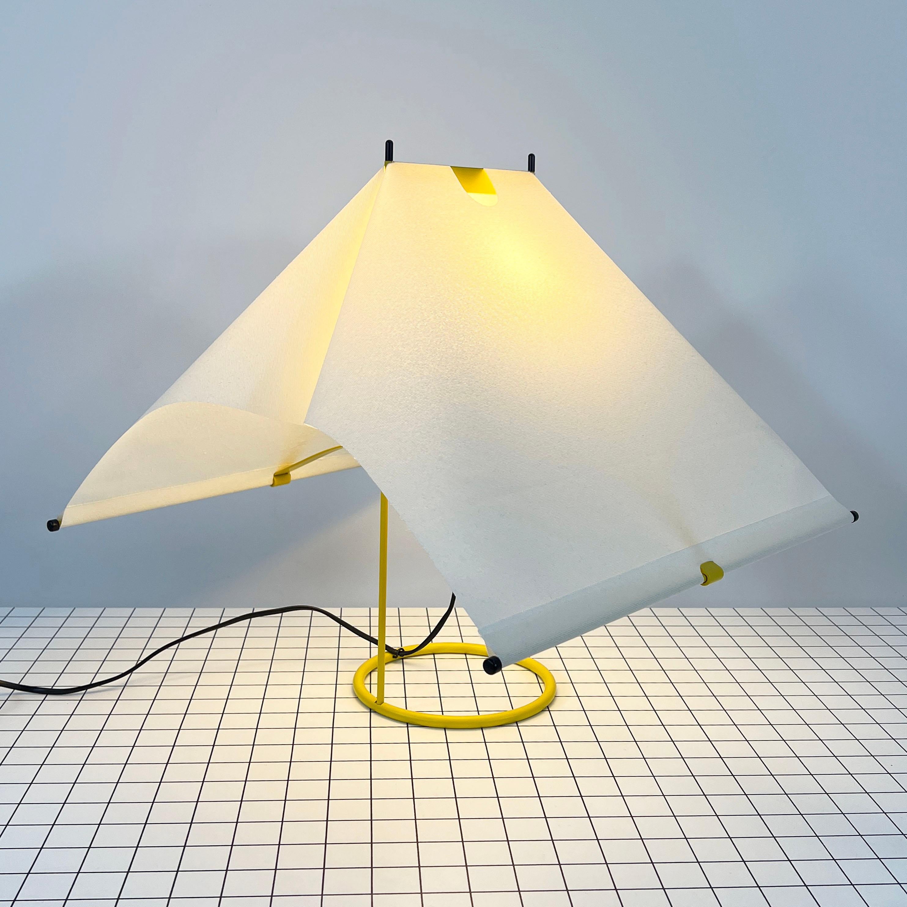Designer - Piero De Martini 
Producer - Arteluce
Model - Le Falene Table Lamp 
Design Period - Eighties
Measurements - Width 49 cm x Depth 49 cm x Height 46 cm
Materials - Lacquered Steel, Taut Fabric Shade
Color - Yellow, White 
Electrical