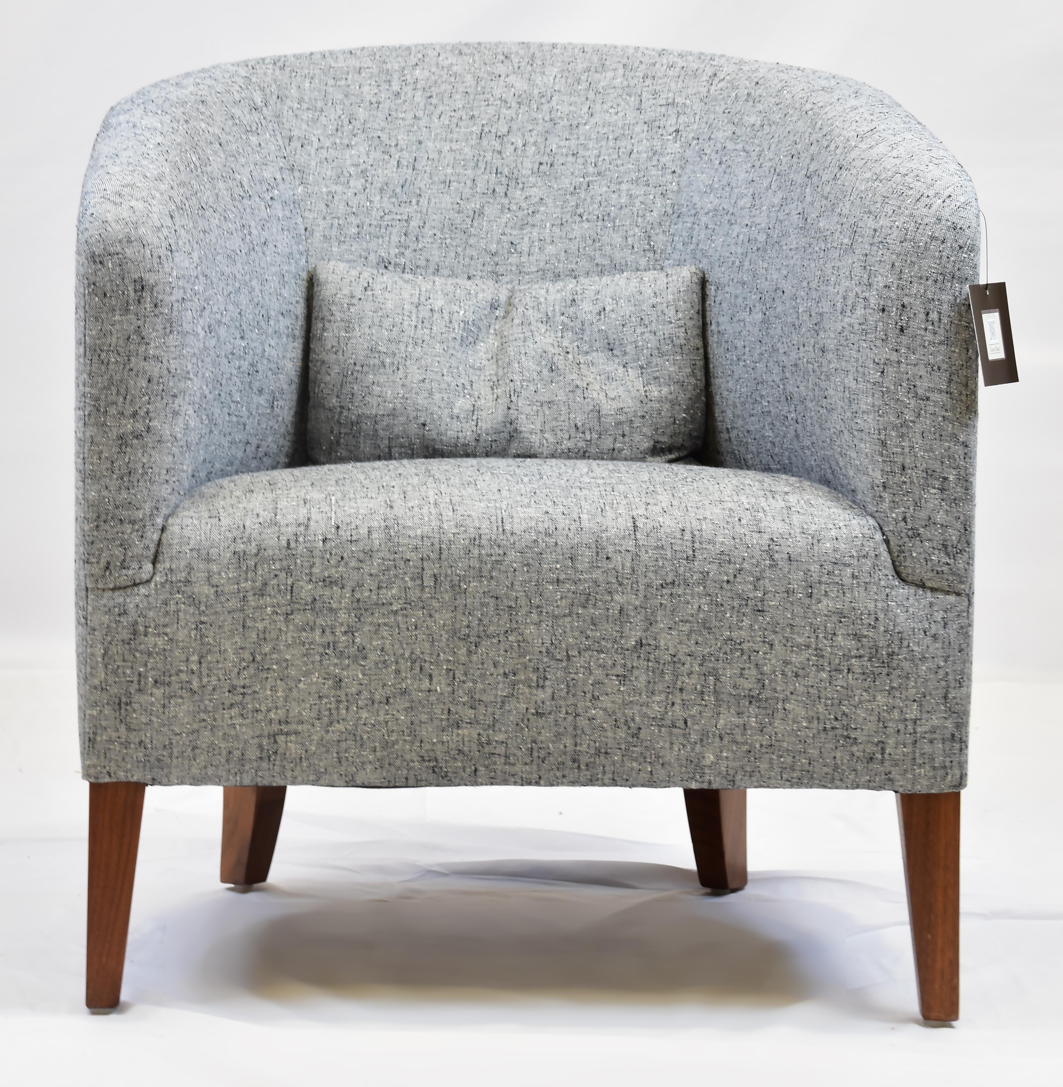 Le Jeune Upholstery Gino Barrel Back Club Chair Showroom Model

Offered for sale is a Le Jeune Upholstery GINO showroom model club chair. The chair is medium-scaled barrel chair with a tight seat and back sitting style. The legs are built using