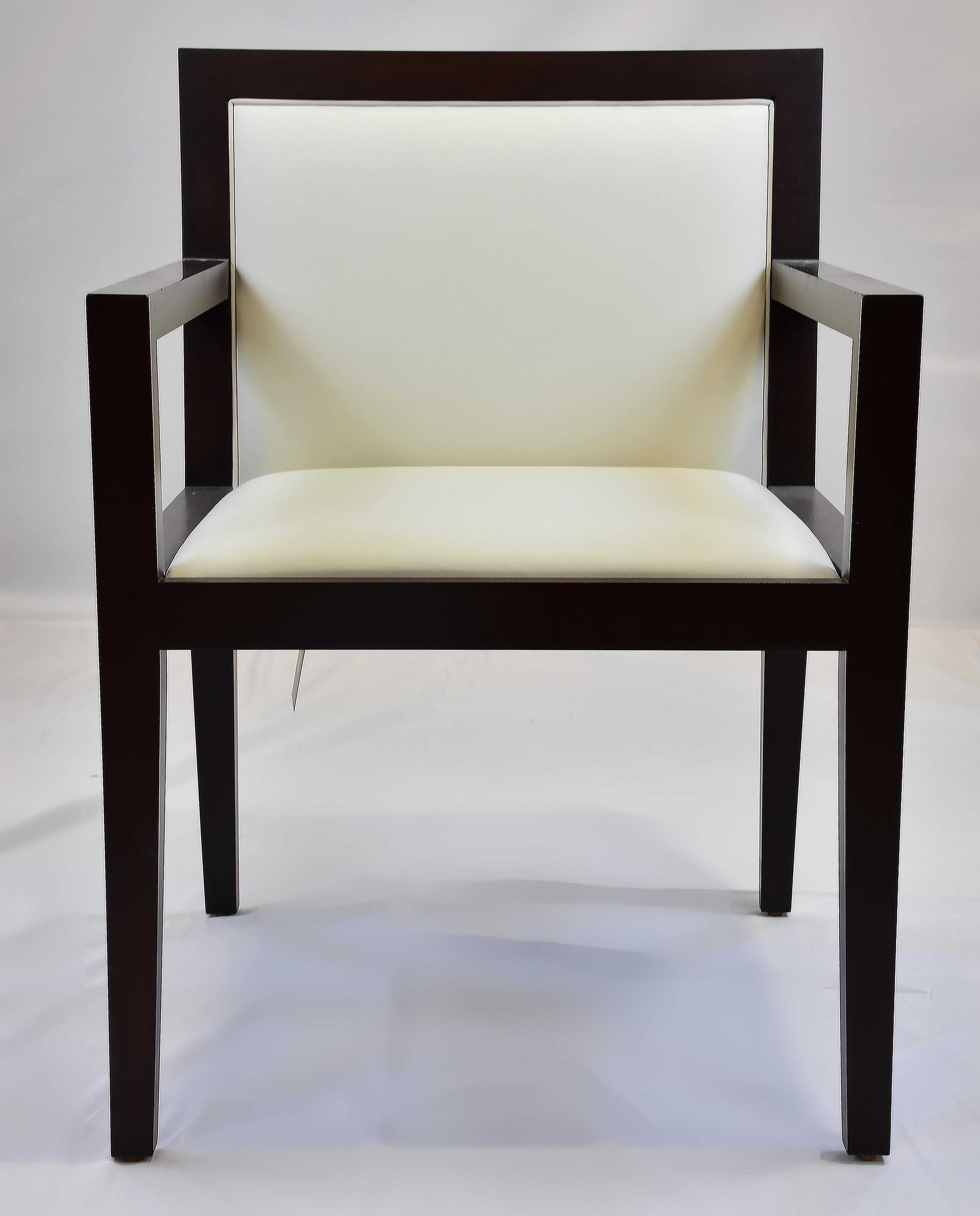 Le Jeune Upholstery SLJ1 Dining Desk Armchair Showroom Model

Offered for sale is a Le Jeune Upholstery showroom model SLJ1	DC5.923	Dining Armchair. This is a wood-arm modern desk chair with a thin upholstered seat and back panels all covered in an