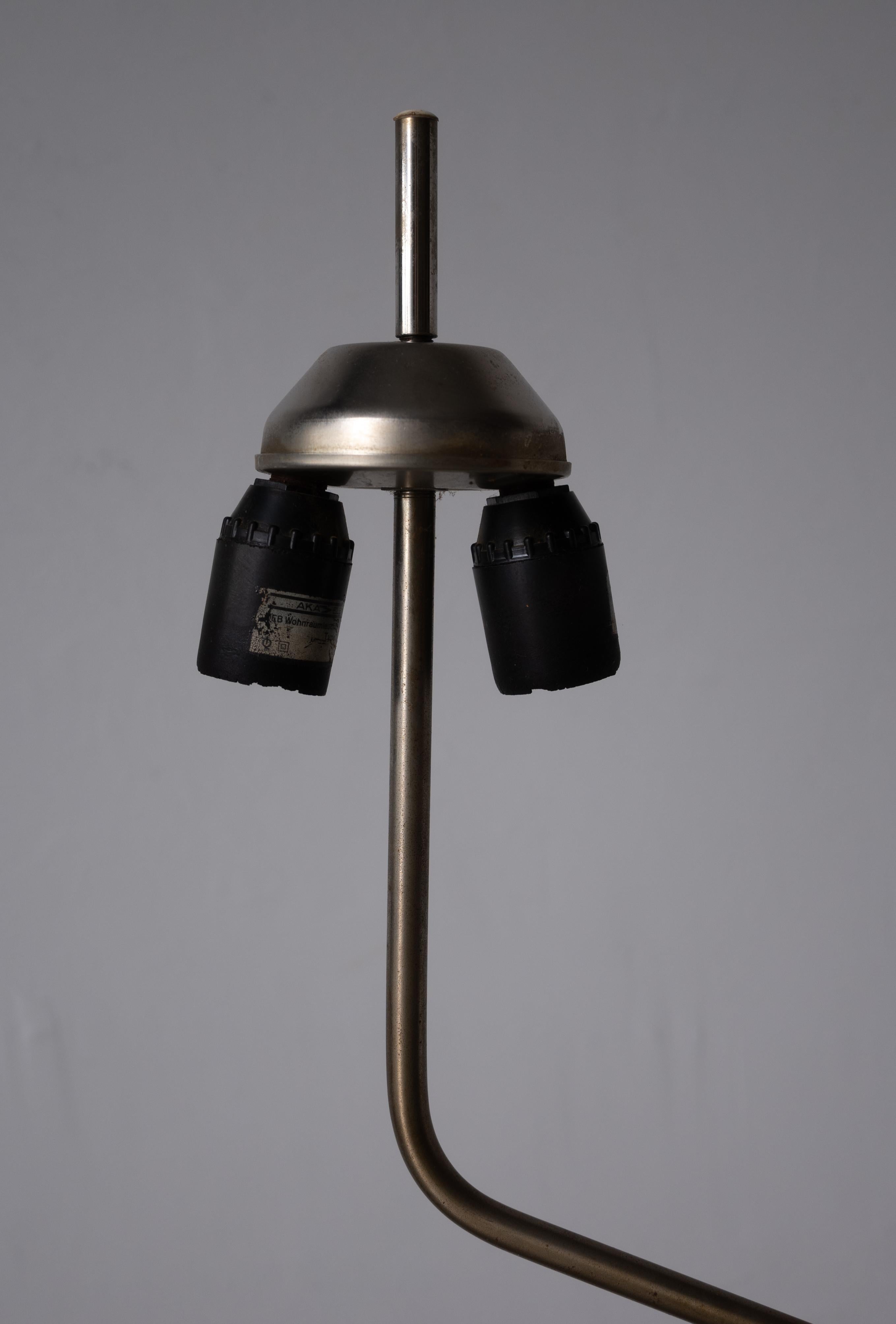 An adjustable floor lamp, designed and produced by Le Klint, Denmark, 1960s.