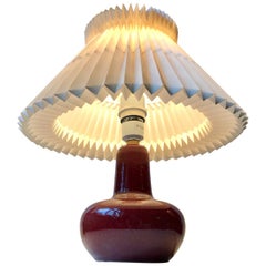 Le Klint Ceramic Table Lamp with Oxblood Glaze by Ole Bøgild, 1970s