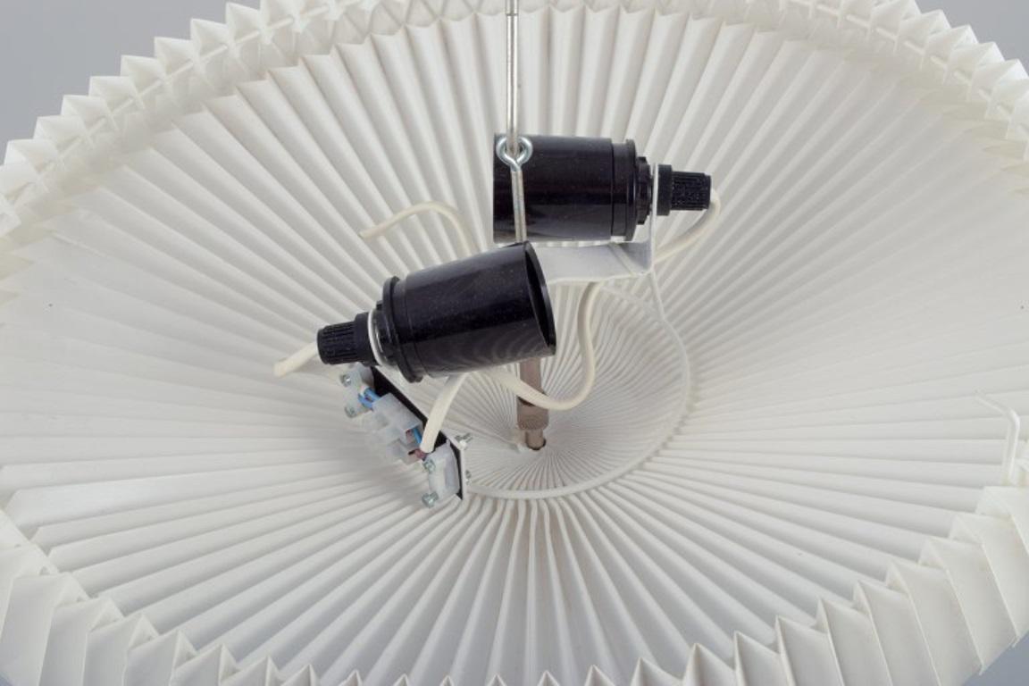 Scandinavian Modern Le Klint, Danish lamp designer. Ceiling lamp. Hand-folded paper shade. For Sale