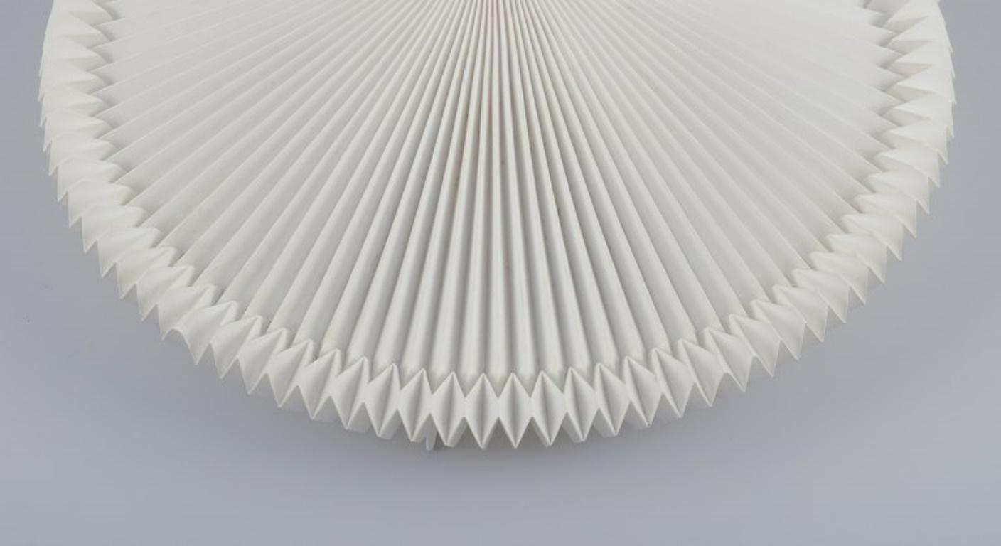 Steel Le Klint, Danish lamp designer. Ceiling lamp. Hand-folded paper shade. For Sale