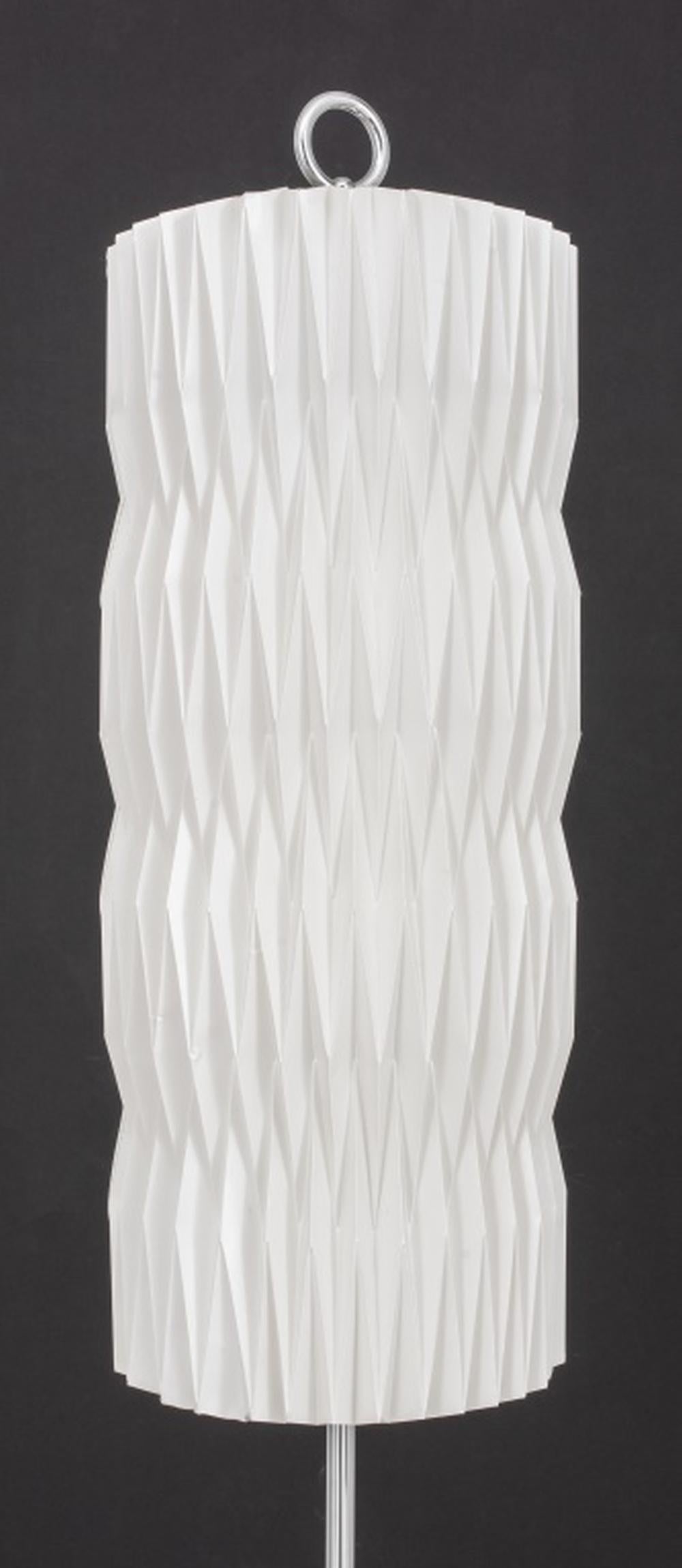 Danish Modern Le Klint floor lamp with origami shade model 102 raised on a chrome metal base. Measures: 66