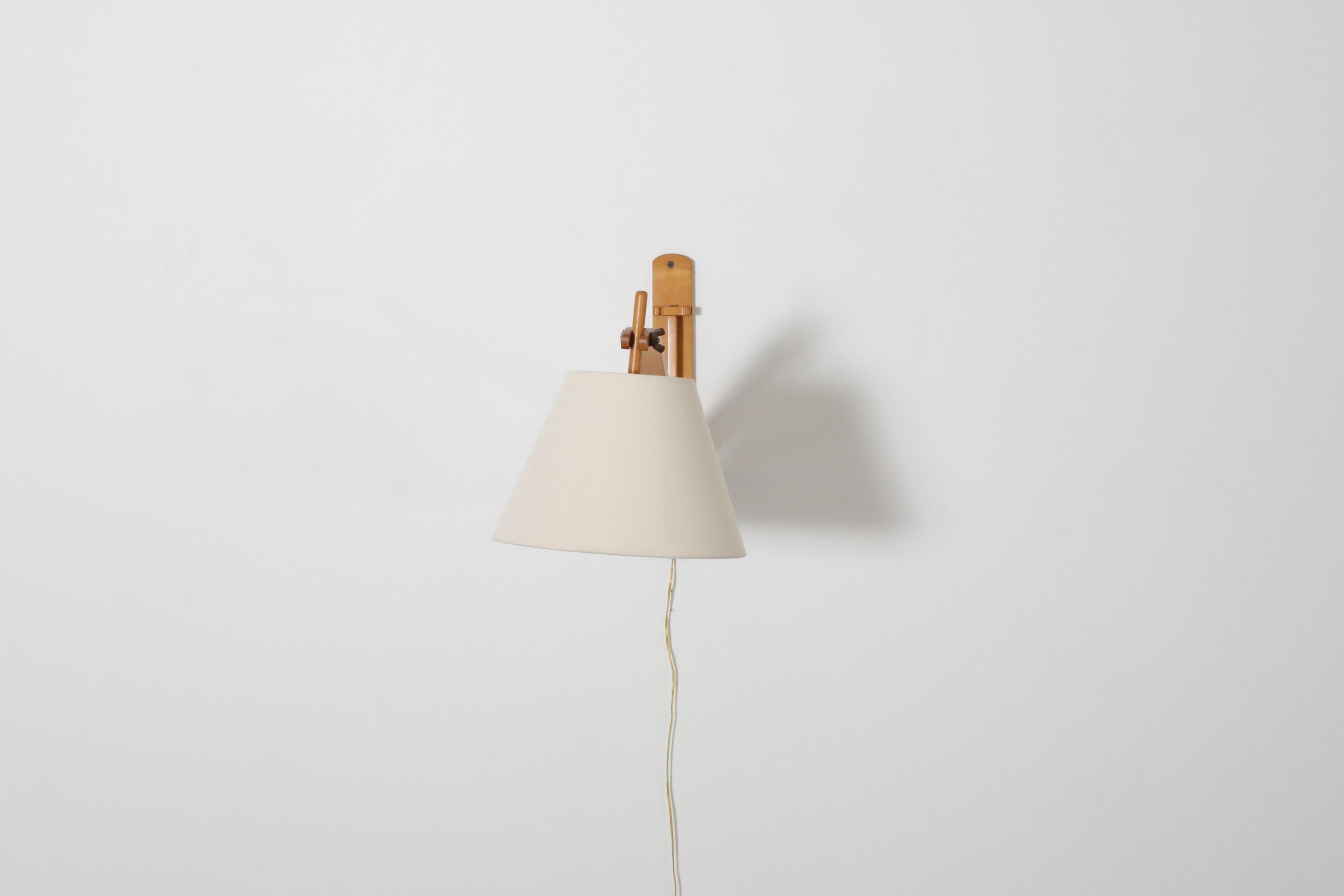 Mid-20th Century Le Klint style Mid-Century Wall Mount Lamp in Blonde Wood For Sale