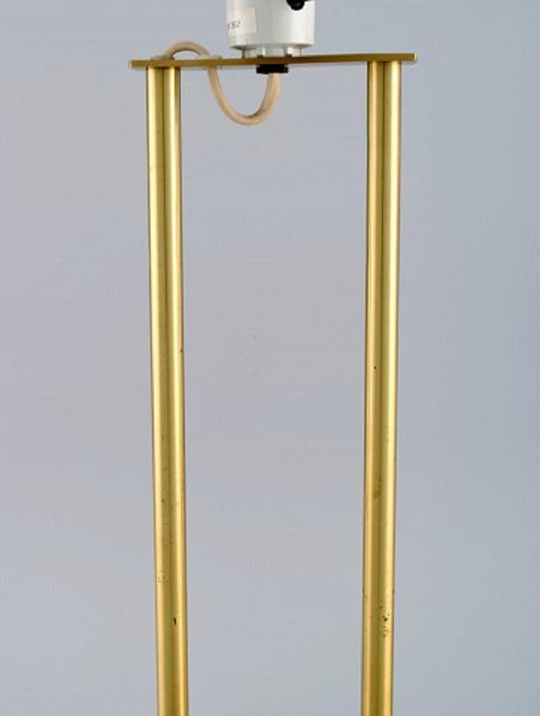 Le Klint table lamp in brass. Danish design, 1970s.
Measures: 36.5 x 19.5 cm (ex socket).
In excellent condition.