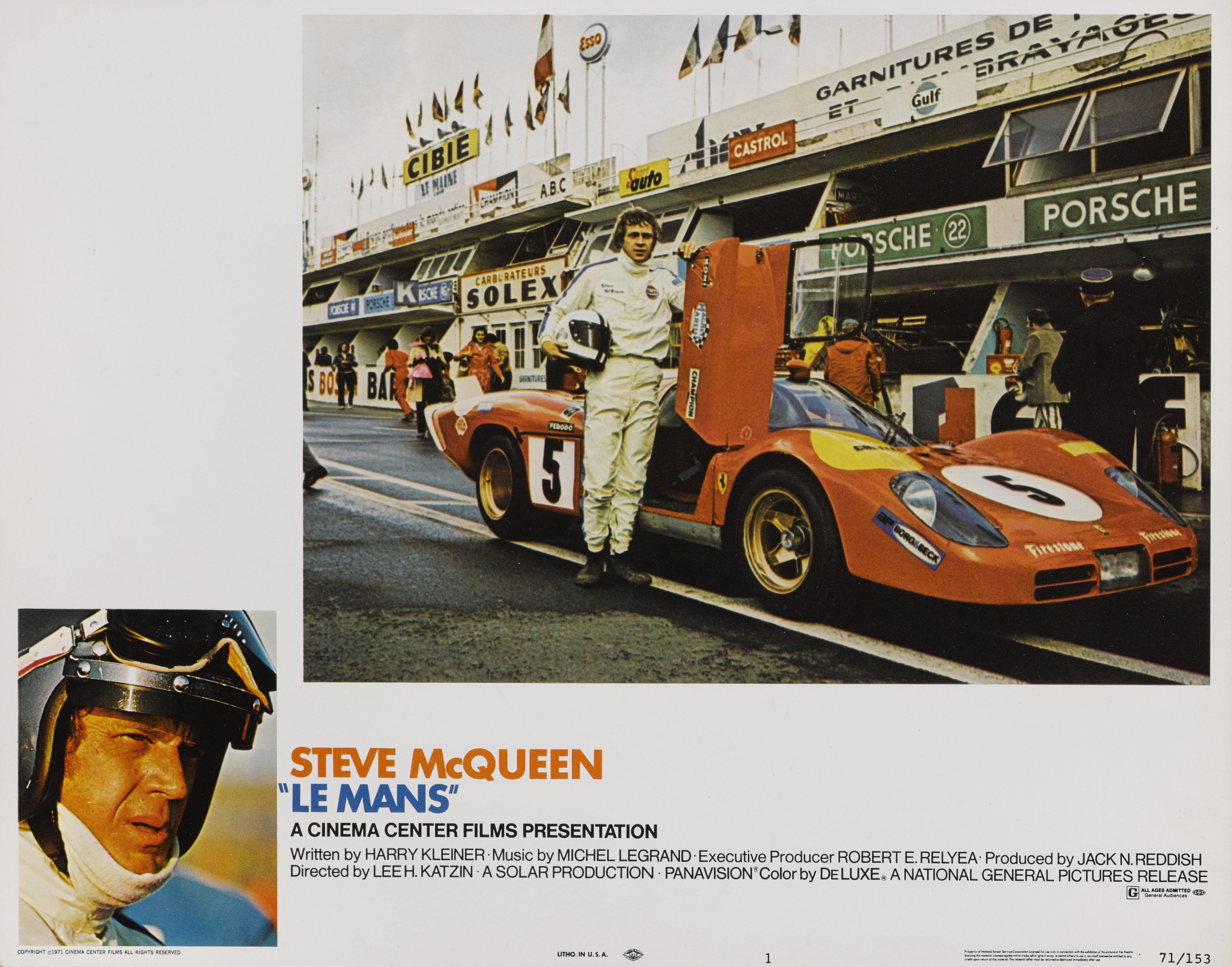 Original US Lobby card for Steve McQueen's 1971 film Le Mans. This card shows him standing next to the Porsche 908 K Flunder Spyder which was his personal car.