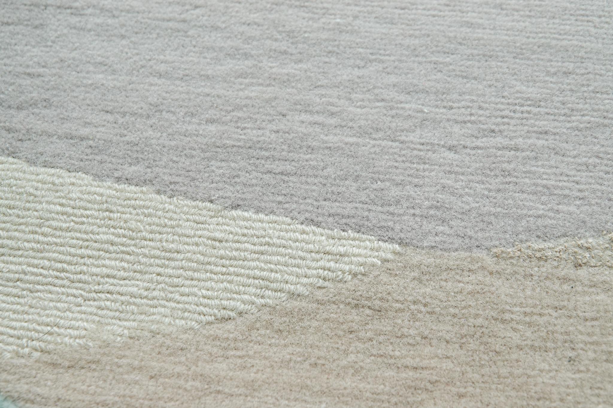 Rug design as a symphony of color

Democratic rug for spaces with elements of light, warm woods and natural light. The rug is composed of free-form and free-sized figures, which complement each other.  Delicate pastel colors are combined with dusty