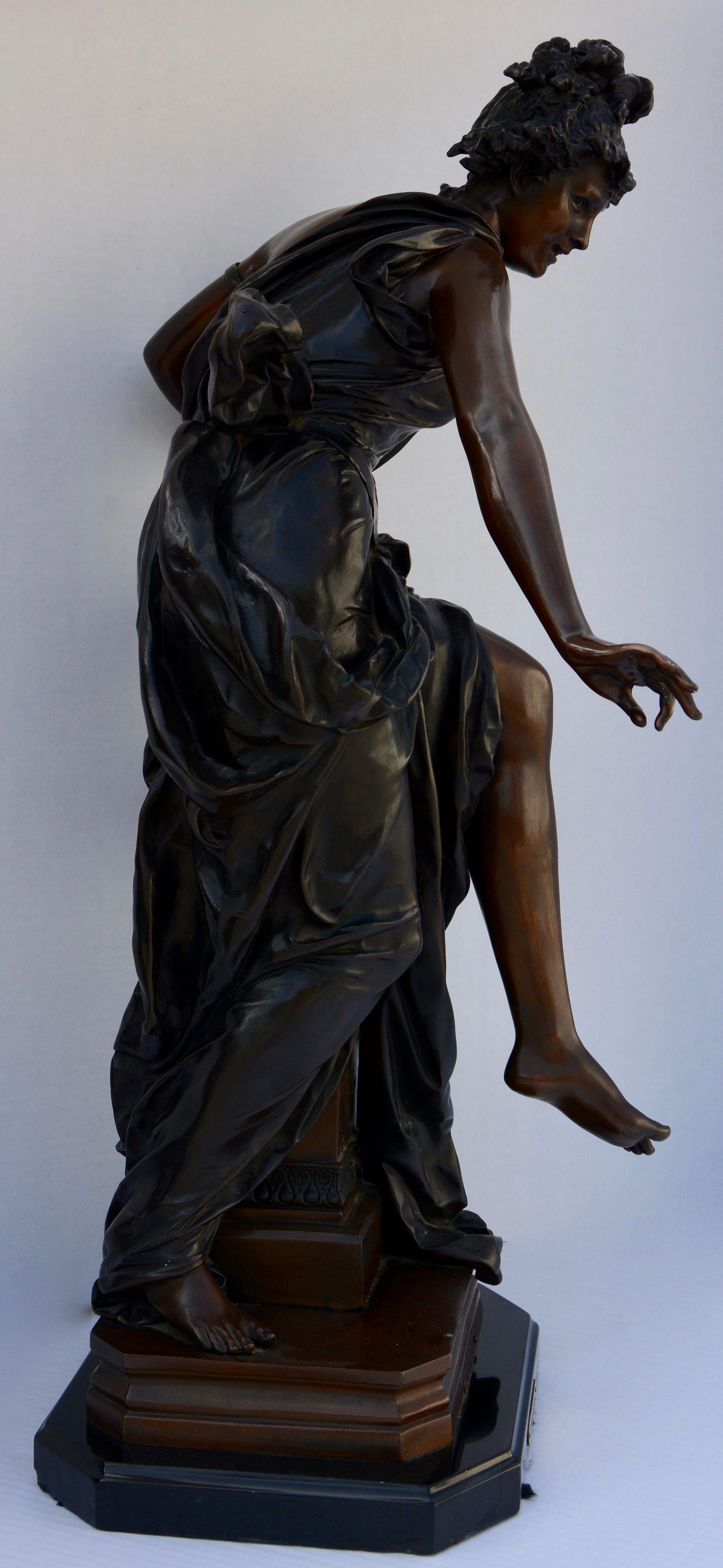 This is a late 19th century Le Melodie bronze sculpture by Albert-Ernest Carrier-Belleuse. It features a lady with her harp and lovely attire. The piece is marked.