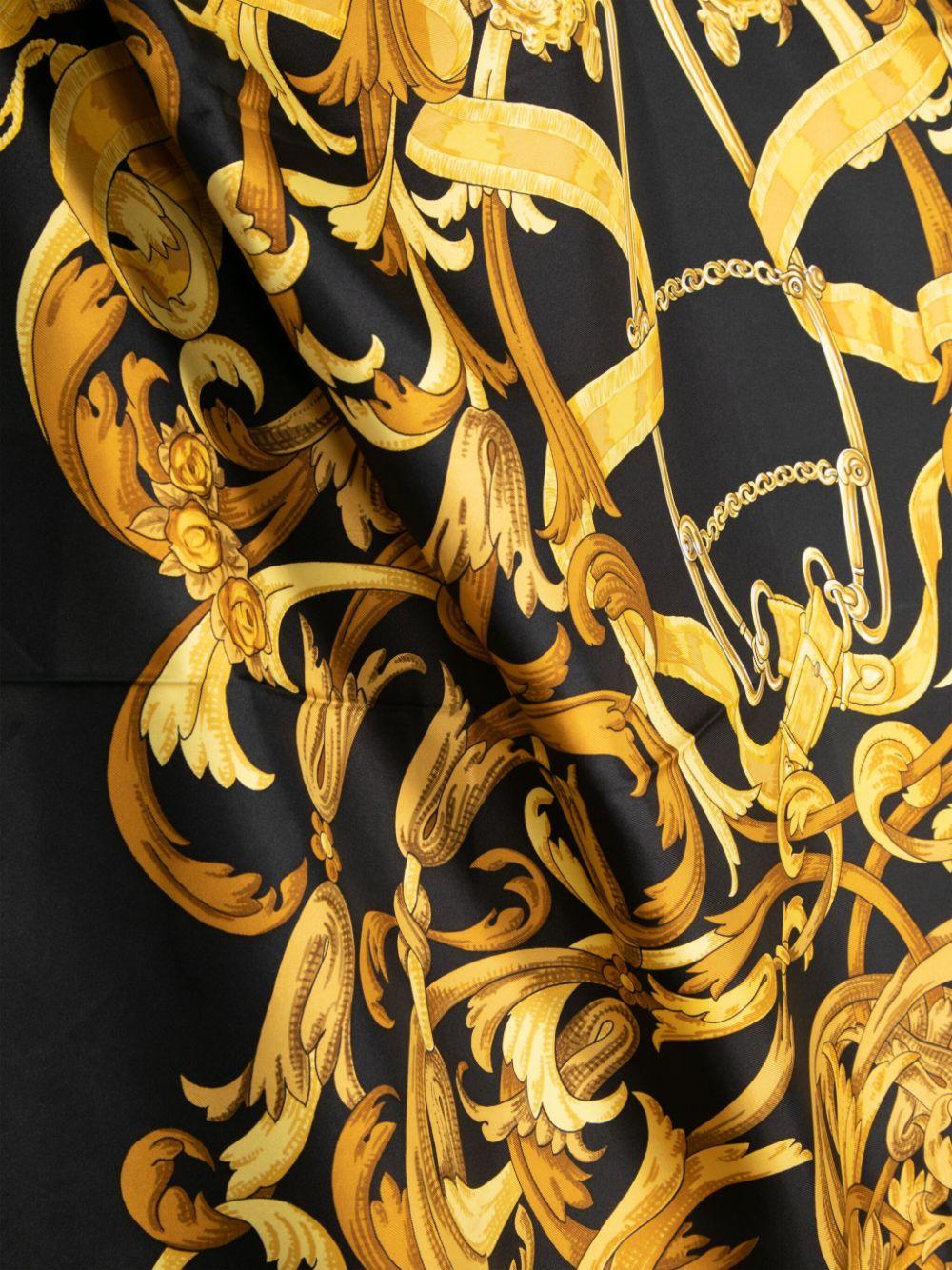 This luxurious Silk Scarf in black and yellow by Hermes is the perfect accessory for any outfit. Made from high-quality silk, it offers both style and comfort. The smooth texture and vibrant colour add a touch of elegance to your look. Elevate your