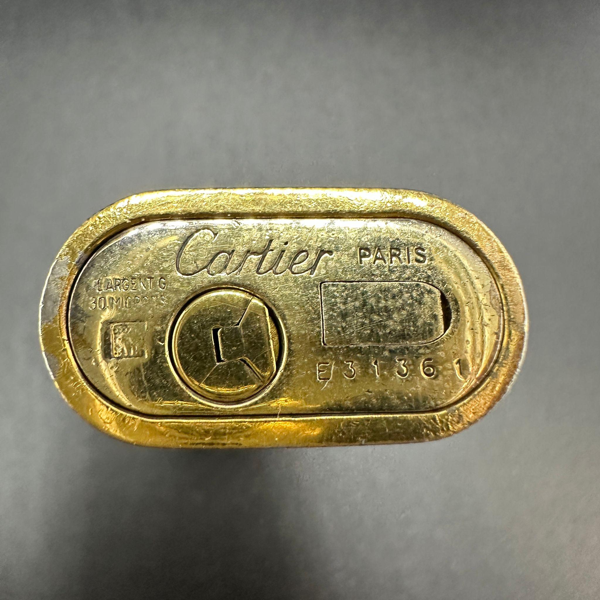 Le Must de Cartier Very Rare Royking Lighter, 18k Gold Plated & ‘Enamel Inlay 
Cartier “Royking” lighter.
Circe 1970
CARTIER  Roy King Rollagas, a Unique RARE example of a ROYKING designed Cartier Rollagas lighter made circa 1970's, 18K Gold Baroque