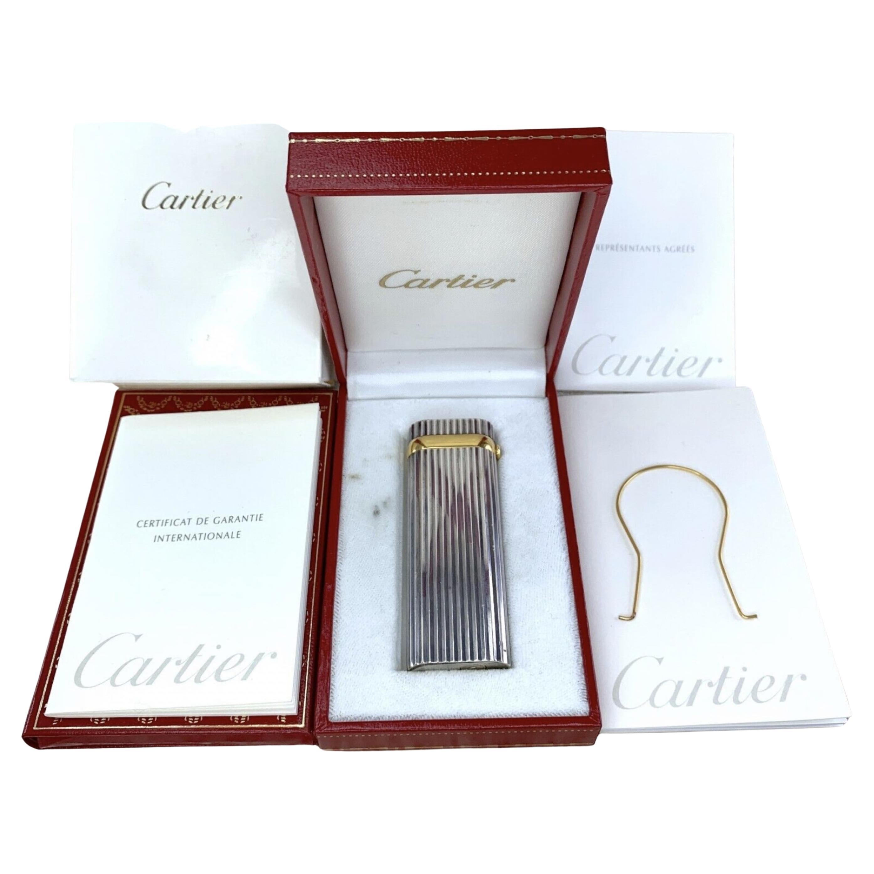 Le Must De Cartier 
Vintage Cartier Briquet 
Argent et or 18K 
