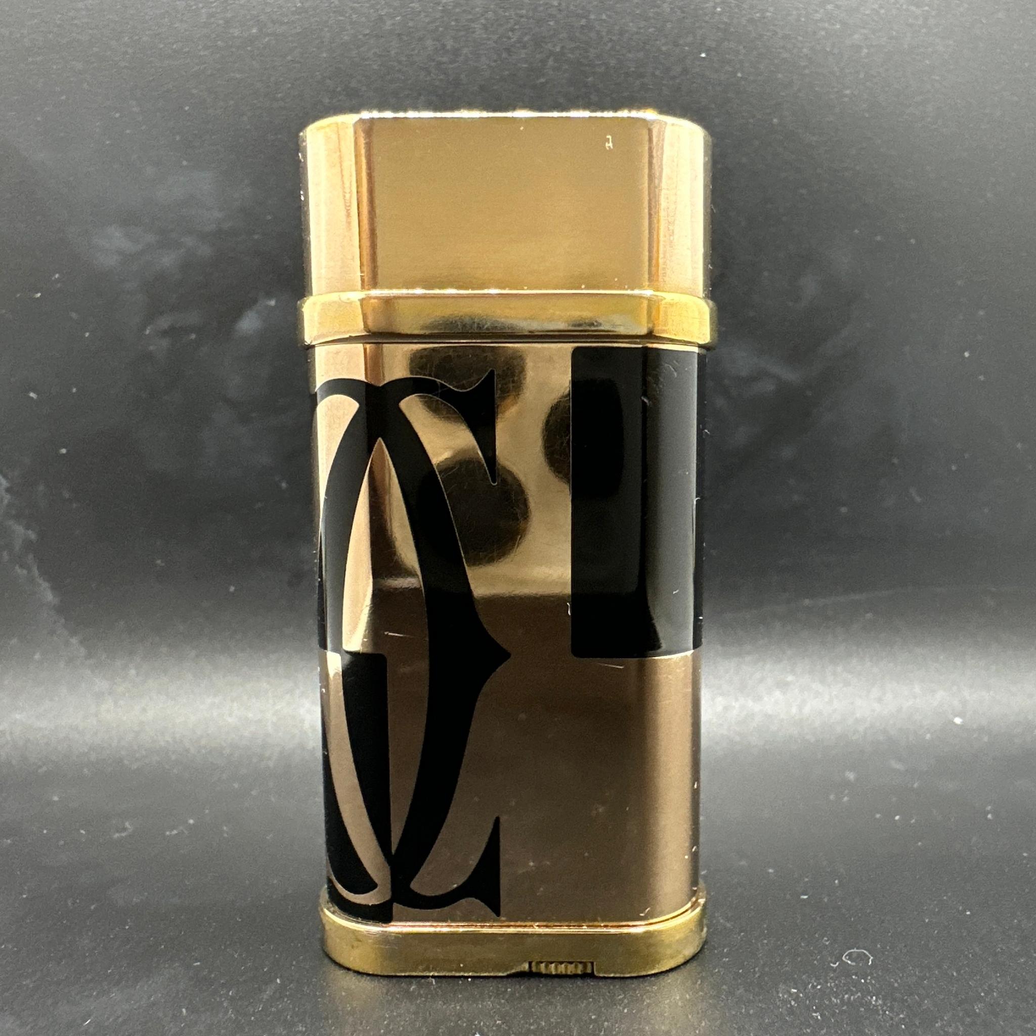 Retro “Le Must the Cartier” Paris Logotype Yellow Gold and Black Lacquer Lighter