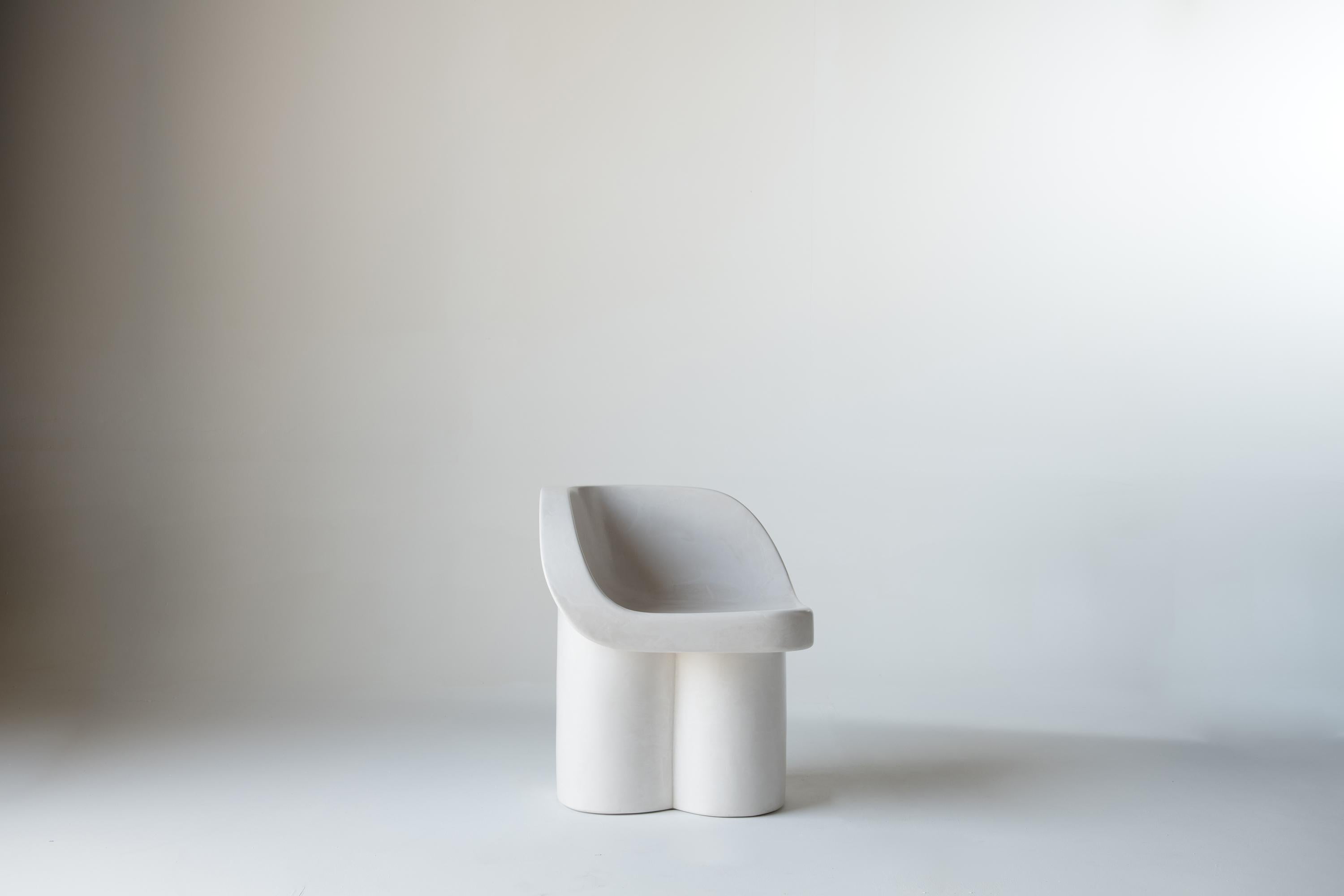 Le Petit elephant chair is hand carved from gypsum plaster and polished with the sensitivity and attention of a sculptor. Having been carved by hand, the surface contains a pleasing subtlety.
