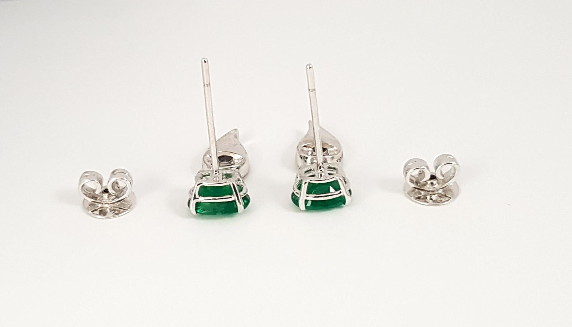 Mixed Cut Le Phoenix Emerald Earrings Set in 18K White Gold Settings For Sale