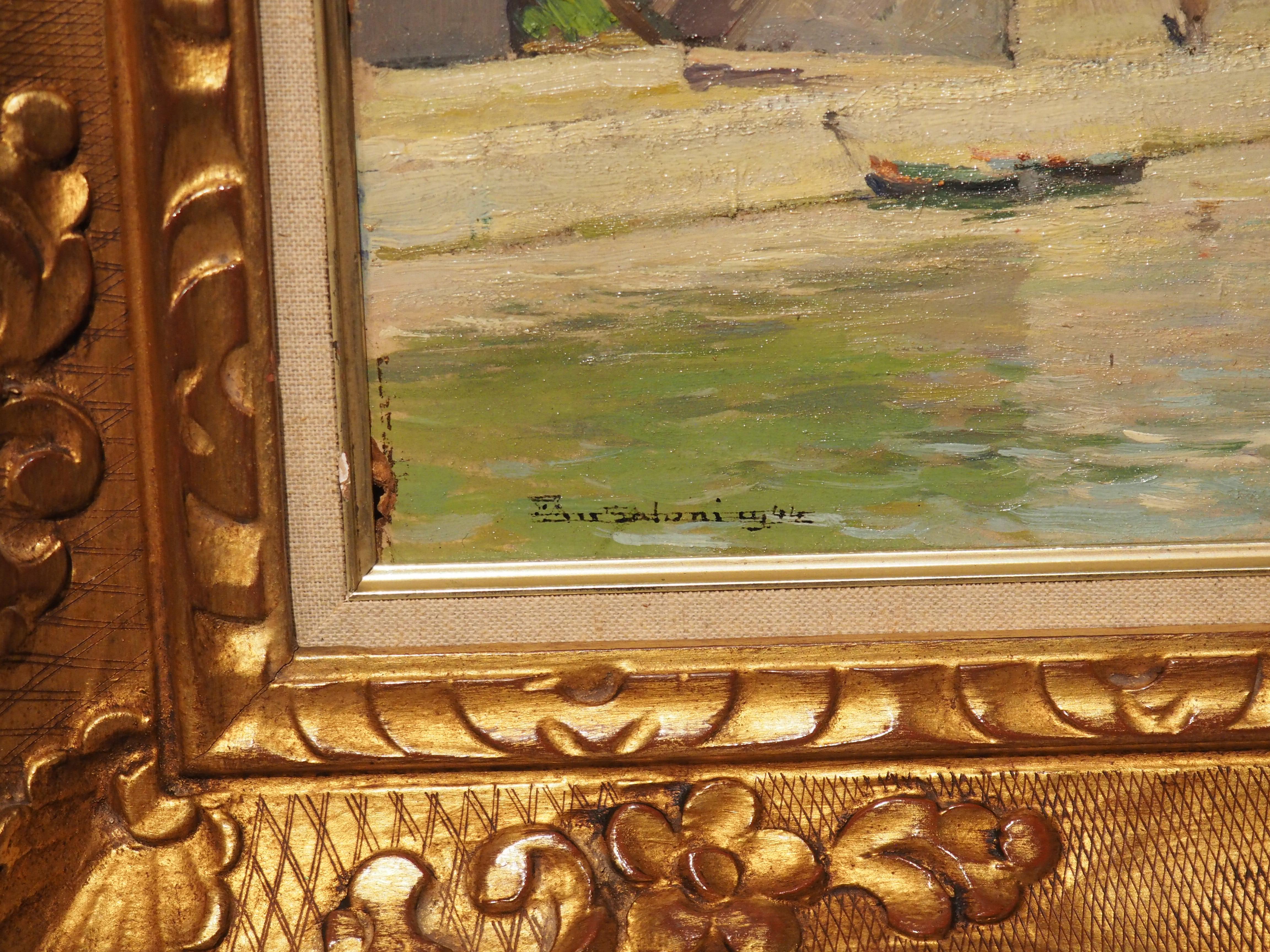Le Pont Neuf, the oldest existing bridge to span the Seine in Paris, is the subject of this painted board in giltwood frame, signed and dated in the lower left corner by the artist, “Ansaloni 44”. A portion of the famed arched bridge can be seen