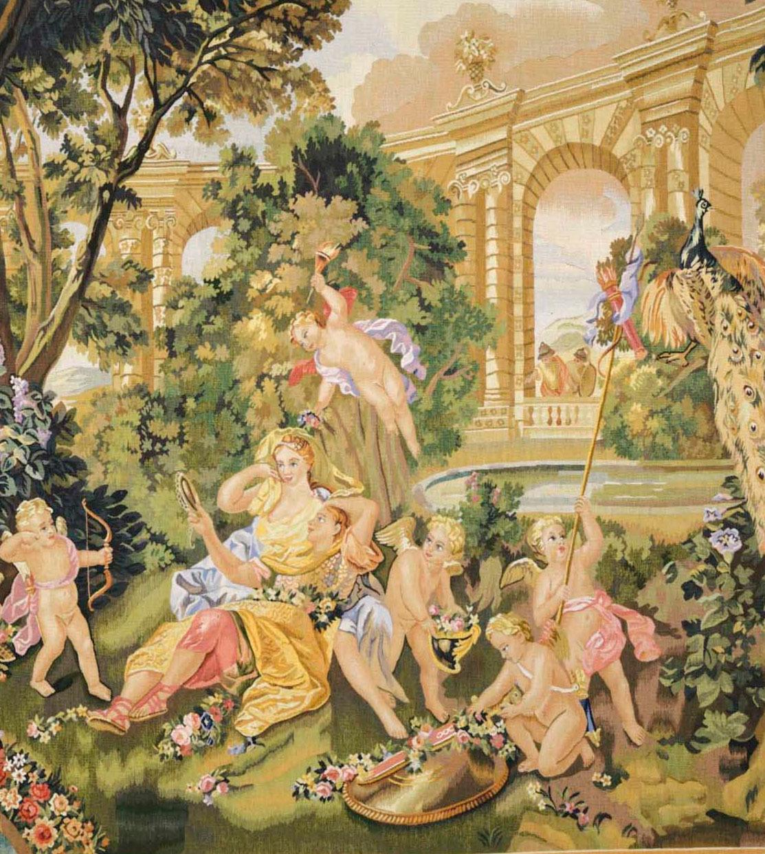 Recreation of a classical Gobelins design of cherubs and a young couple, in an opulent garden setting of lush crops in a very romantic palette of greens and pinks. Creating the perfect setting for romance. The fountain cascading water sets the scene