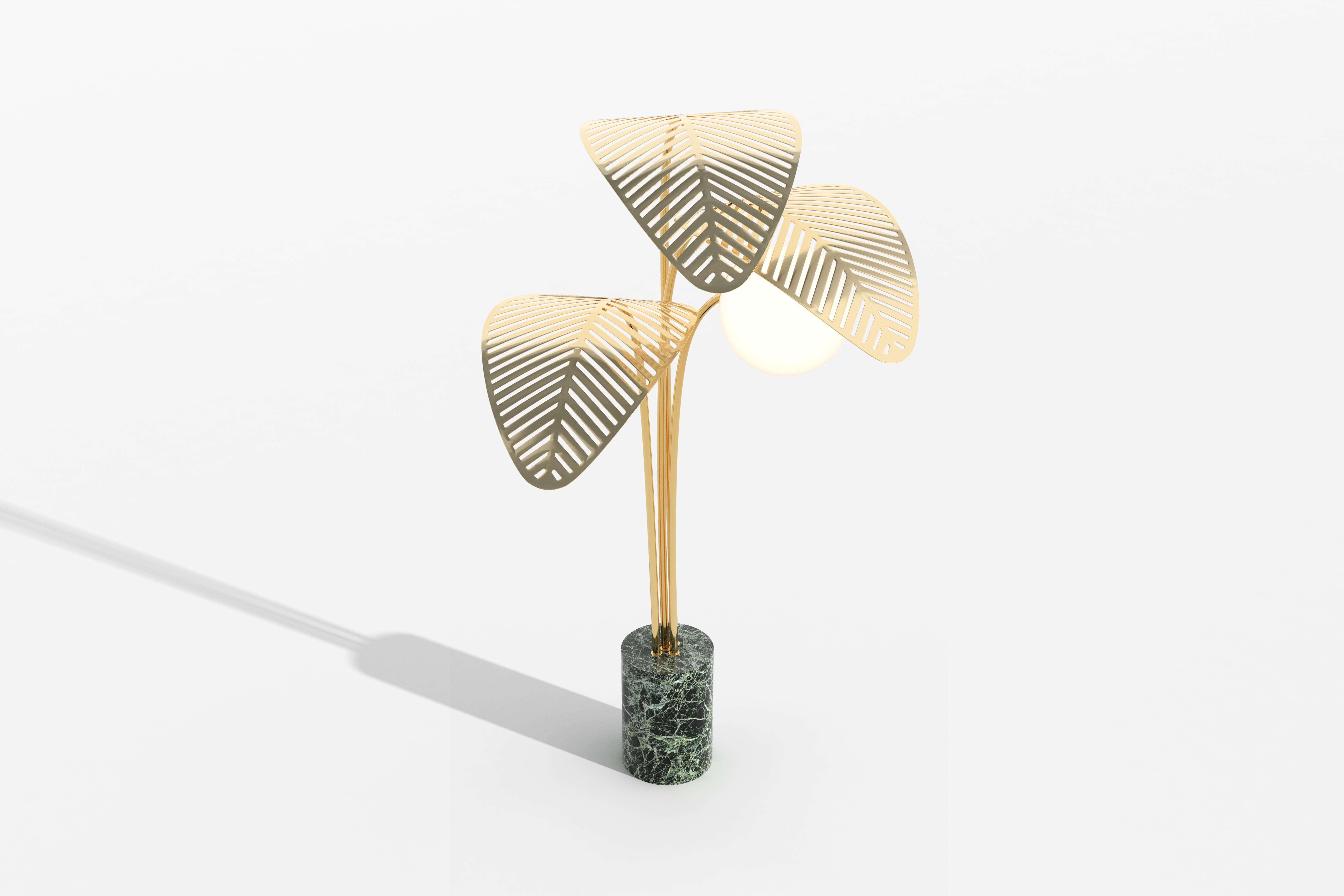 Le Refuge lamps are the natural evolution of Marc Ange's ever-popular Le Refuge day-bed. 

Floor lamp with Verde Alpi green marble base, and 3 giant palm leaves, die-cut in gold metal.
Frosted lamp shade and dimmable light.

Designed by