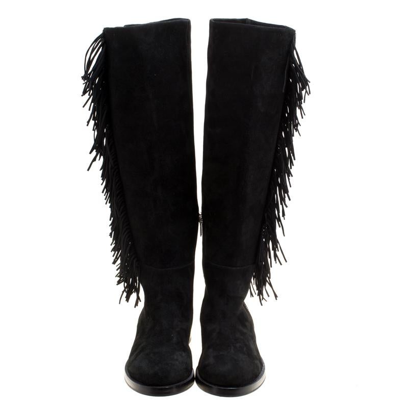 Let your latest shoe addition be this fabulous pair of knee-length boots from Le Silla. The black boots have been crafted from suede and feature round toes. They are complete with leather-lined insoles and silver-tone side zip closures with a fringe