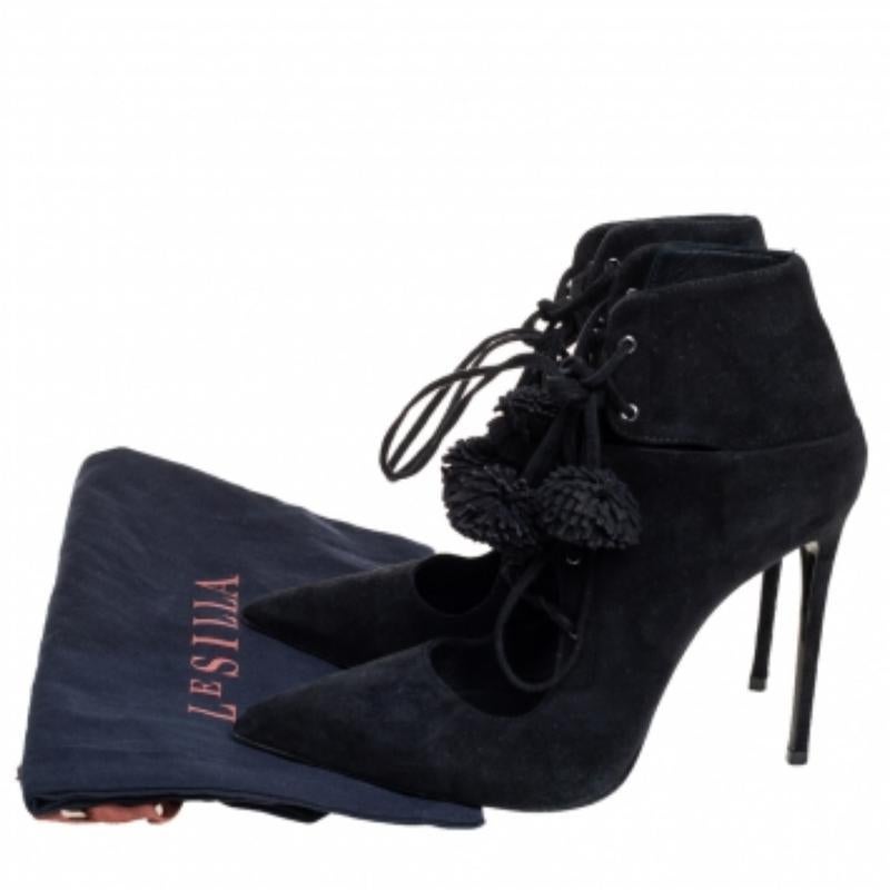 The stunning black shade of this pair of Le Silla booties can never go wrong when it comes to accessorizing the perfect dress. Crafted from suede, the pointed-toe silhouette is adorned with laces and high stiletto heels. Style them with anything