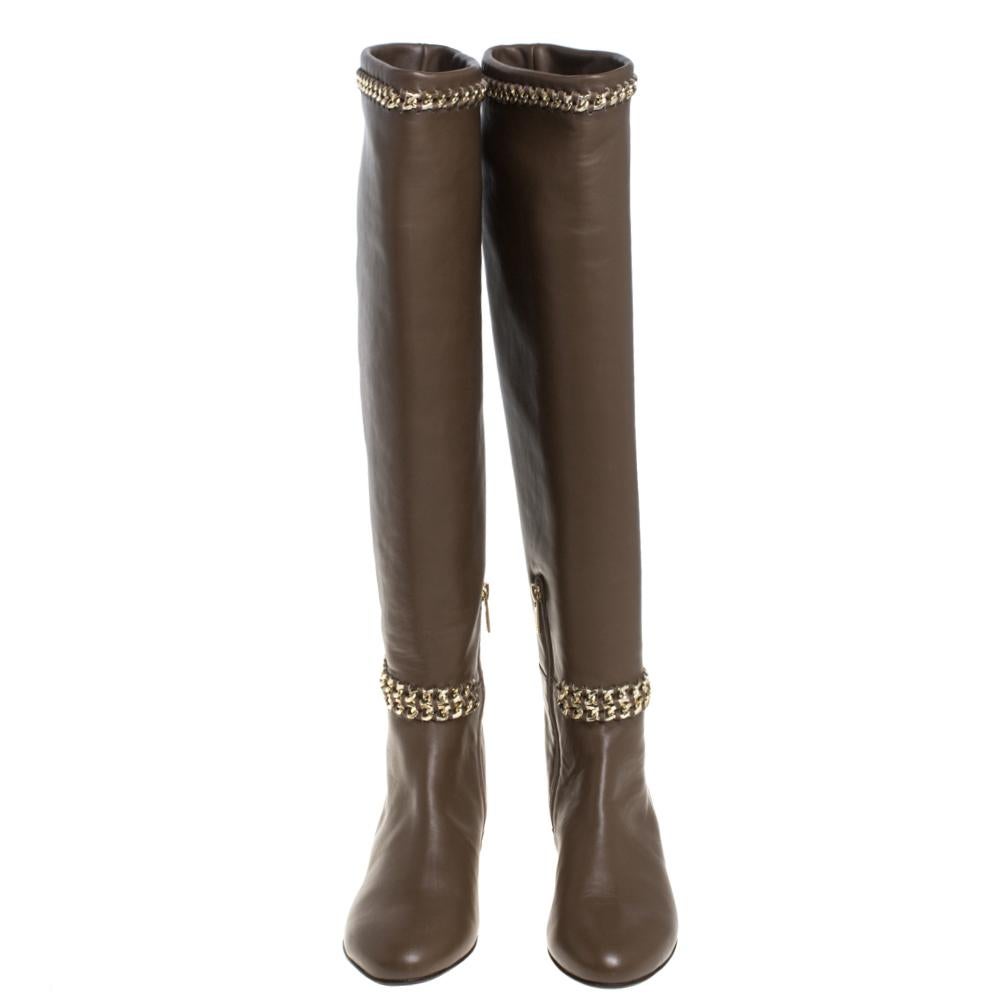Let your latest shoe addition be this fabulous pair of knee-high boots from Le Silla that will make you stand out in the crowd. The brown boots are crafted from leather and feature round toes. They are equipped with leather-lined insoles and