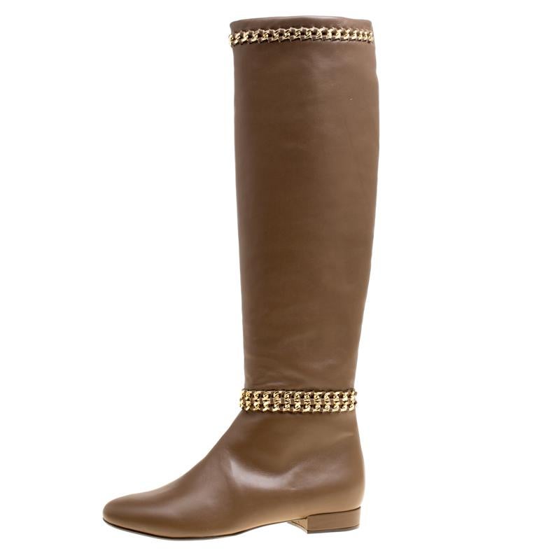 Let your latest shoe addition be this fabulous pair of knee-high boots from Le Silla that will make you stand out in the crowd. The brown boots are crafted from leather and feature round toes. They are equipped with leather lined insoles and