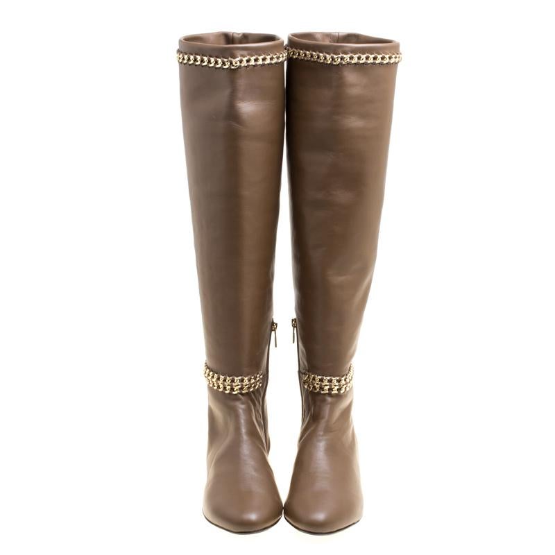 Let your latest shoe addition be this fabulous pair of knee-high boots from Le Silla that will make you stand out in the crowd. The brown boots are crafted from leather and feature round toes. They are equipped with leather lined insoles and