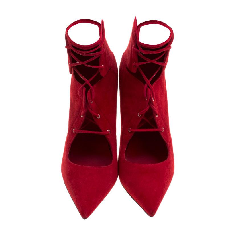 The red in this pair of Le Silla Red Suede Lace Up Pointed Toe Ankle Boots is a killer when it comes to the perfect party wear or that perfect date-wear. The suede and leather finish with a 12cm heel size, matches with your red dress and brings that