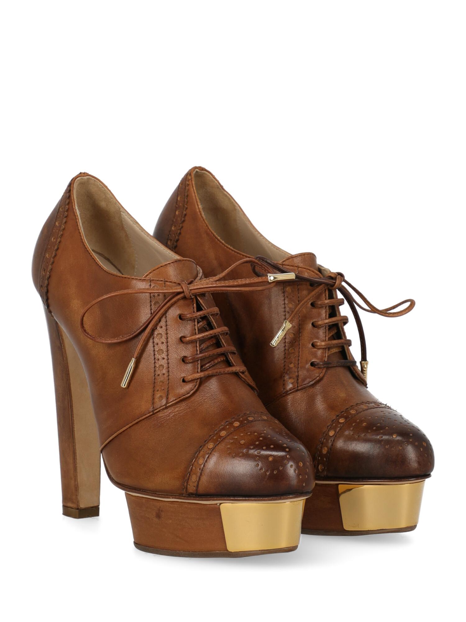 Shoe, leather, solid color, internal logo, lace-up, gold-tone hardware, round toe, leather insole, stiletto heel, high heel.

Product Condition: Very Good
Heel: visible mark. Sole: negligible signs of use. Upper: slightly visible stains.