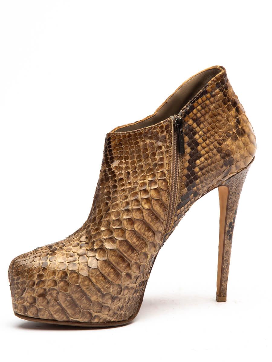 CONDITION is Very Good. Minor wear to boots is evident. Minor wear to the exterior snakeskin leather where pilling can be seen on this used Le Silla designer resale item.   Details  Brown Snakeskin leather Ankle boots Pointed toe Platform high heel