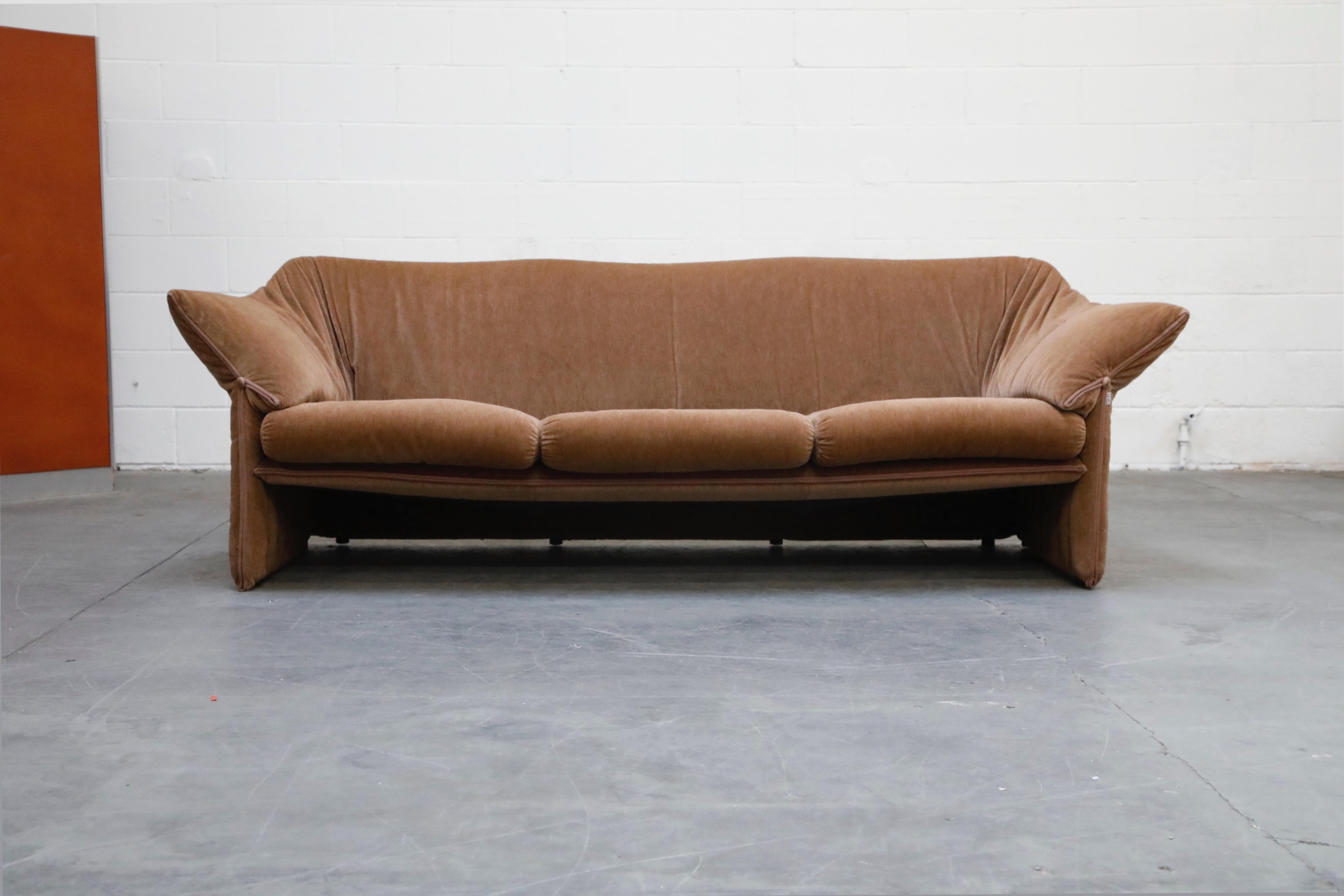 This fantastic three seat 'Le Stelle' sofa by Mario Bellini for B&B Italia was designed in 1974, this early production (original) example is from mid to late 1970s, with soft, cozy and comfortable brown fabric. Excellent collectors example, original
