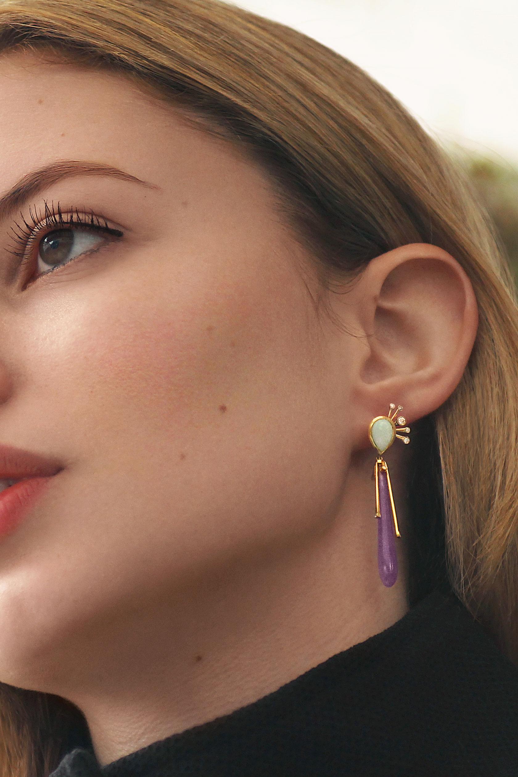 Delicate yet Bold Long Statement Earrings that Encapsulate the Colours of Summer. Handcrafted in 18 Carat Yellow Gold with Opals, Jade and Diamonds.
The Opals stay close to the ear whilst the Jade and lines of gold and diamonds move with your body,