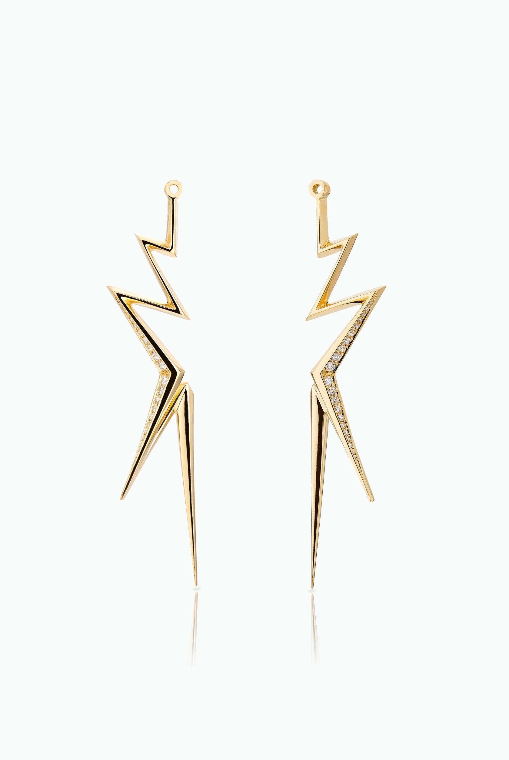 A Modern, Edgy Ear Jacket and Stud Earring for those of you who who are drawn to statement pieces with an element of surprise. Handcrafted in 18 Carat Yellow Gold with Pave Set Brilliant Cut Diamonds. A play of light and line that comes to life when