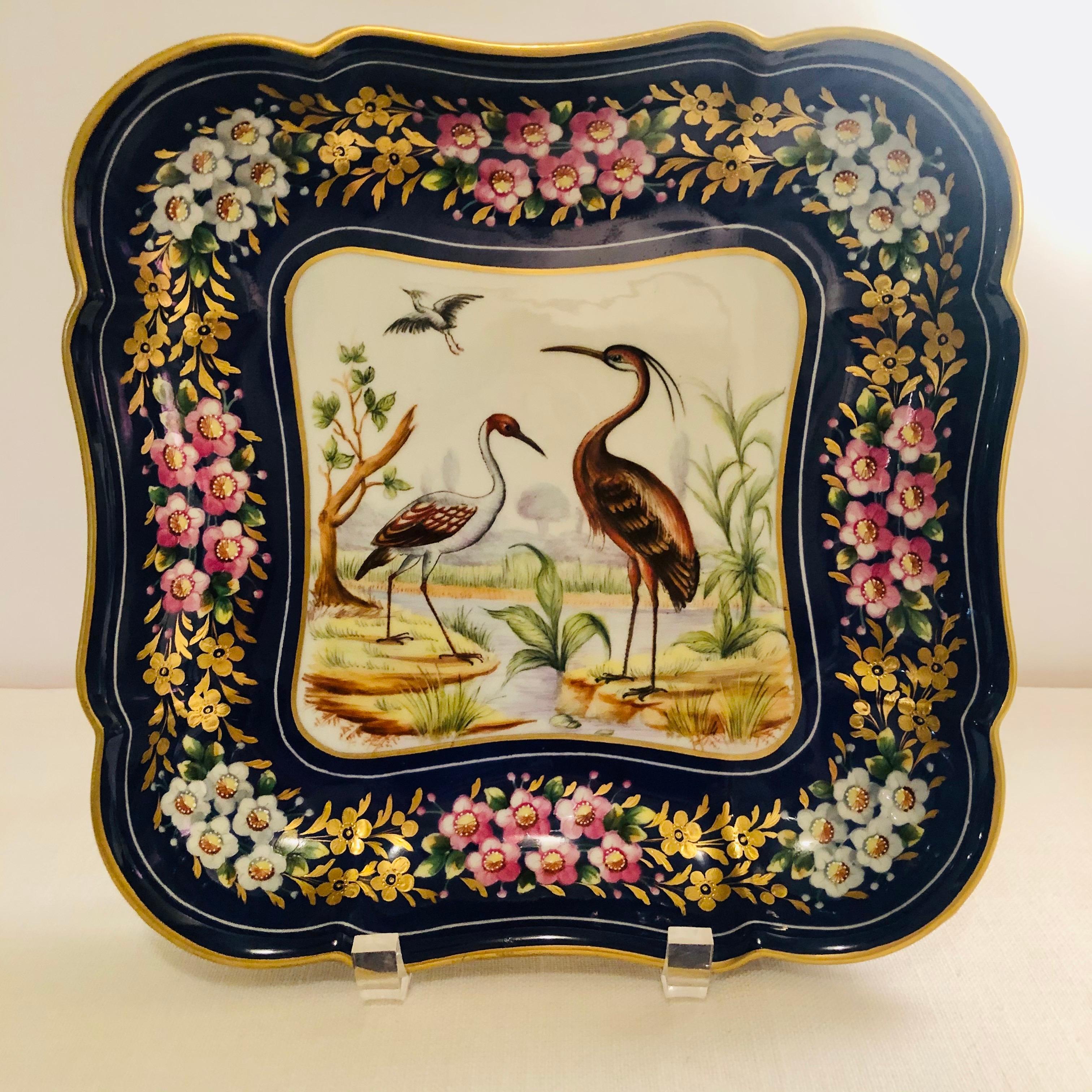 I want to offer you this amazing Le Tallec bowl painted with wonderful exotic birds in their natural habitat. The royal blue color that surrounds the bird painting is eye catching, as it is decorated with colorful flowers including some raised