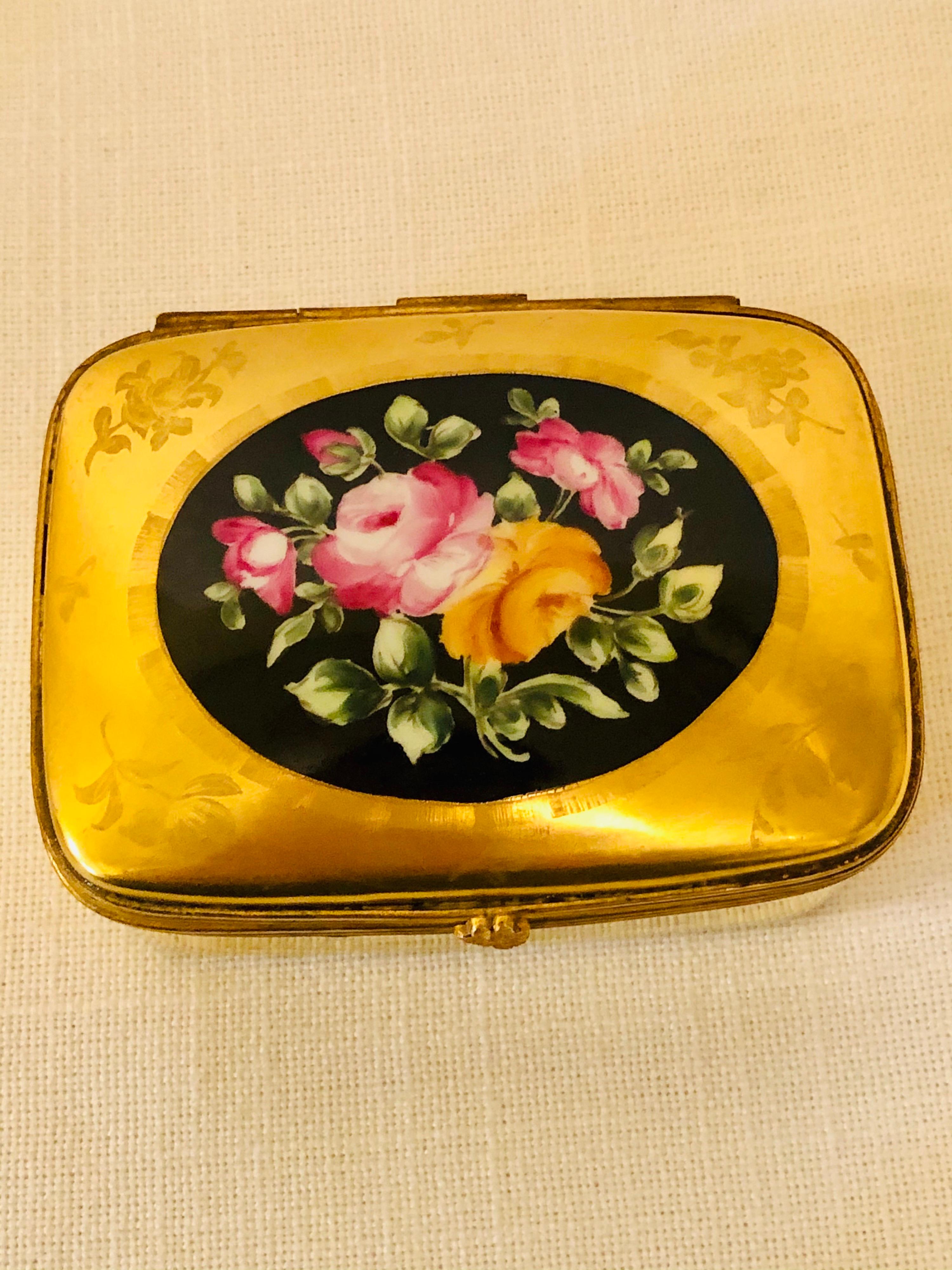 Rococo Le Tallec Box with a Gold BackGround and a Central Painting of a Flower Bouquet