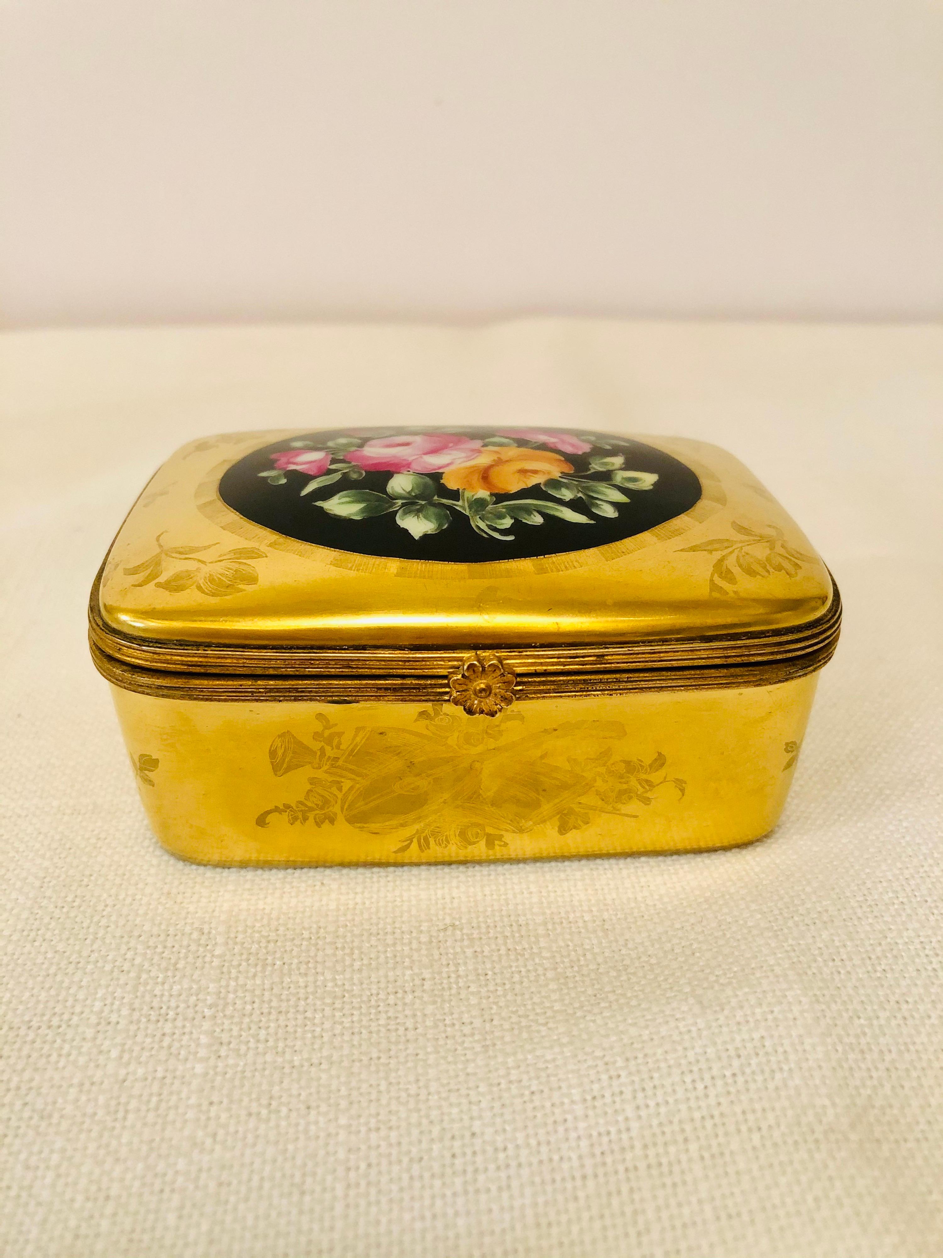 Porcelain Le Tallec Box with a Gold BackGround and a Central Painting of a Flower Bouquet