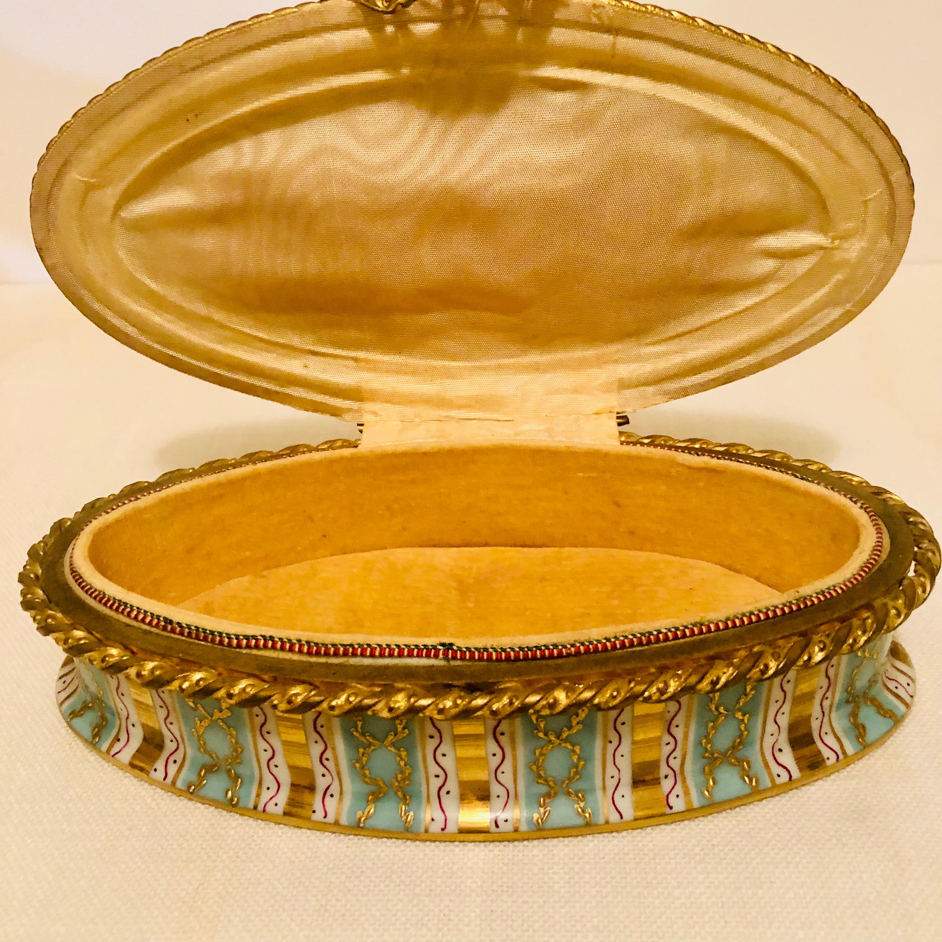 Gilt Le Tallec Box with Aqua and Gold Stripes and Raised Gold Circular Decoration