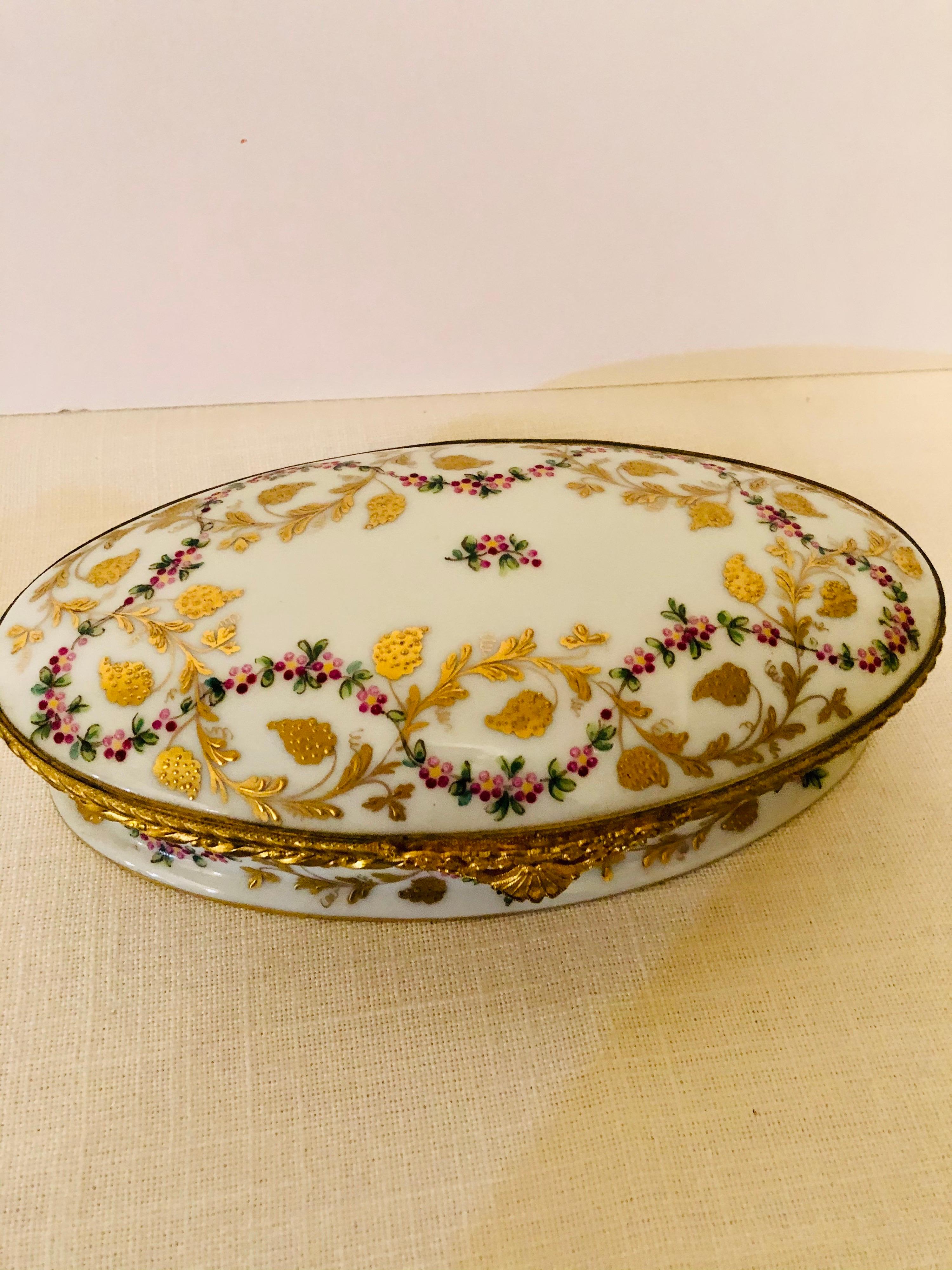 French Le Tallec Oval Box with Raised Gilded Leaves & Raspberries and Ribbon of Flowers